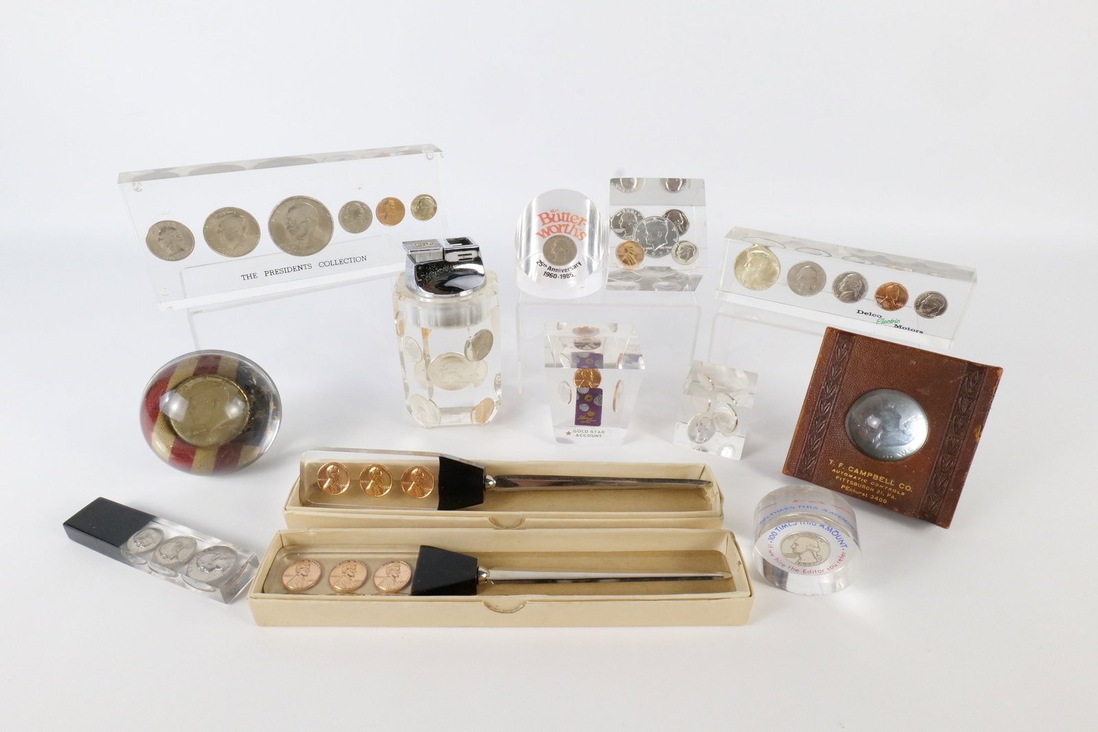 Lot of Lucite Encapsulated Coin Paperweights, Lighter and Letter Openers (1 of 17)
