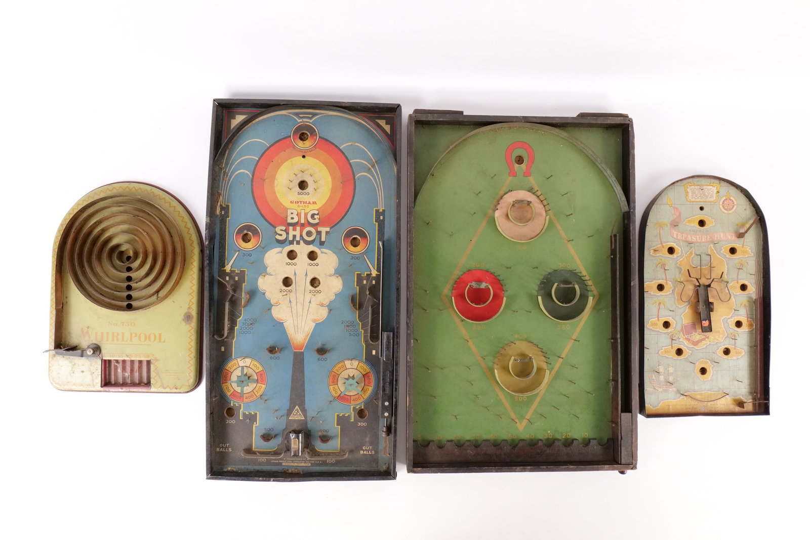 Lot of 4 Vintage/Antique Bagatelle Tabletop Pinball Games: Lot of 4 Vintage/Antique Bagatelle Tabletop Pinball Games. Circa 1920's-1940's. Including Generic Wood and Nail Game - Horseshoe and Diamond Design with Skee-Ball Type Game, Gotham Pressed Steel Corp.