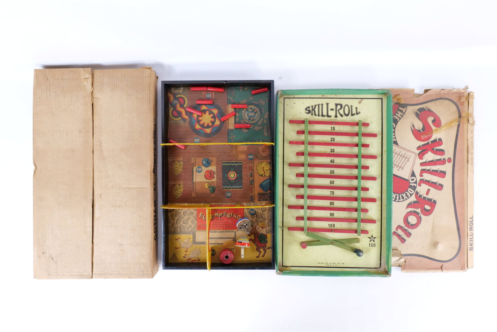 Lot of 2 Vintage Tabletop Lithographed Games: Lot of 2 Vintage Tabletop Lithographed Games. Circa 1950's. Including Gotham "El Jumperino" G-607 Pressed Steel Game with Original Box and Holiday Toy "Skill-Roll" by the Holiday Toy Mfg. Co Wood and 