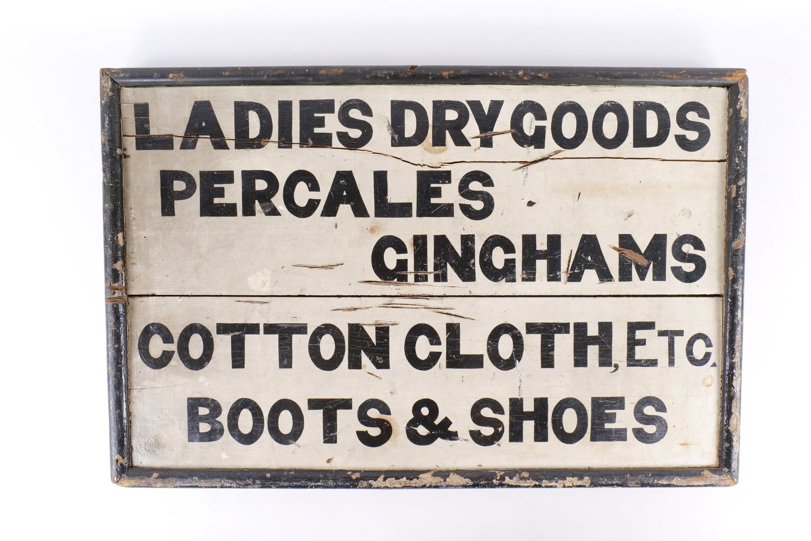 Antique Double Sided Wooden Mercantile Sign: Antique Double Sided Wooden Mercantile Sign - Ladies Dry Goods, Percales, Boots & Shoes. Original Hand Painted Sign. Primitive Wooden Plank Construction with a dark painted raised frame. Natural Wood 