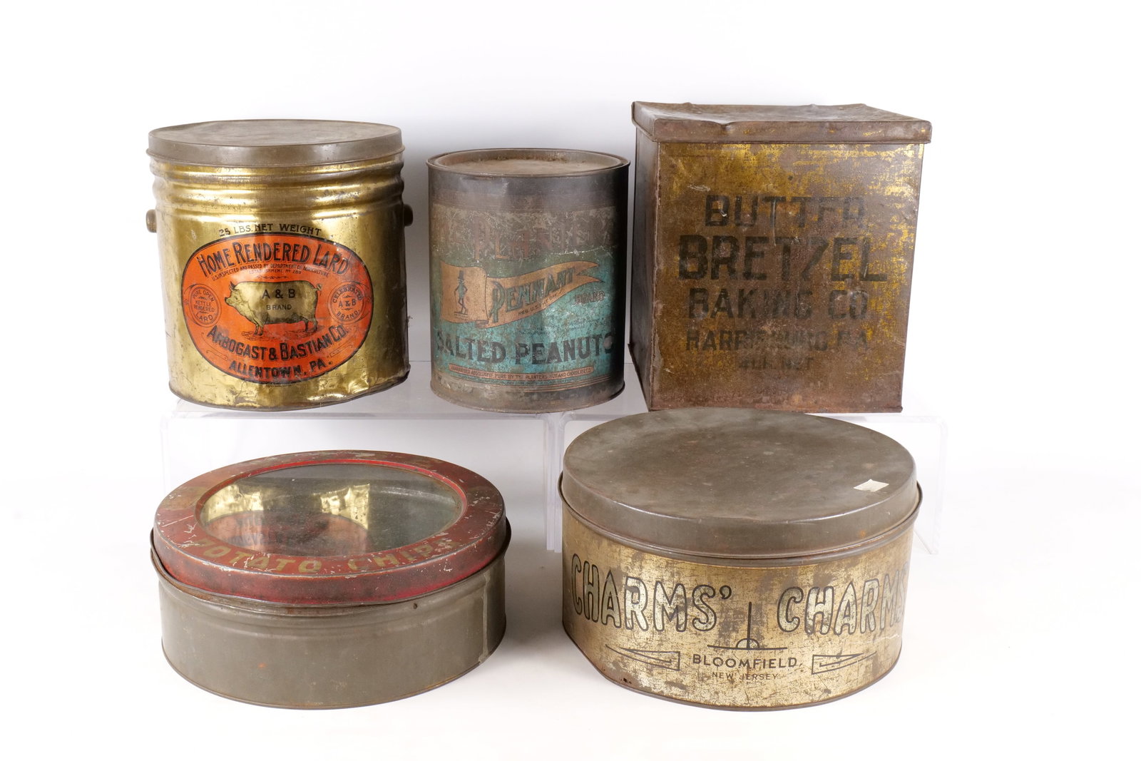 Lot of 5 Antique Advertising Tins: Lot of 5 Antique Advertising Tins. Including Planter's Peanuts, Arbogast & Bastian Home Rendered Lard, Butter Bretzel Baking Co., Charms Candy Squares, and Wise Potato Chips. As-Found Vintage Conditio
