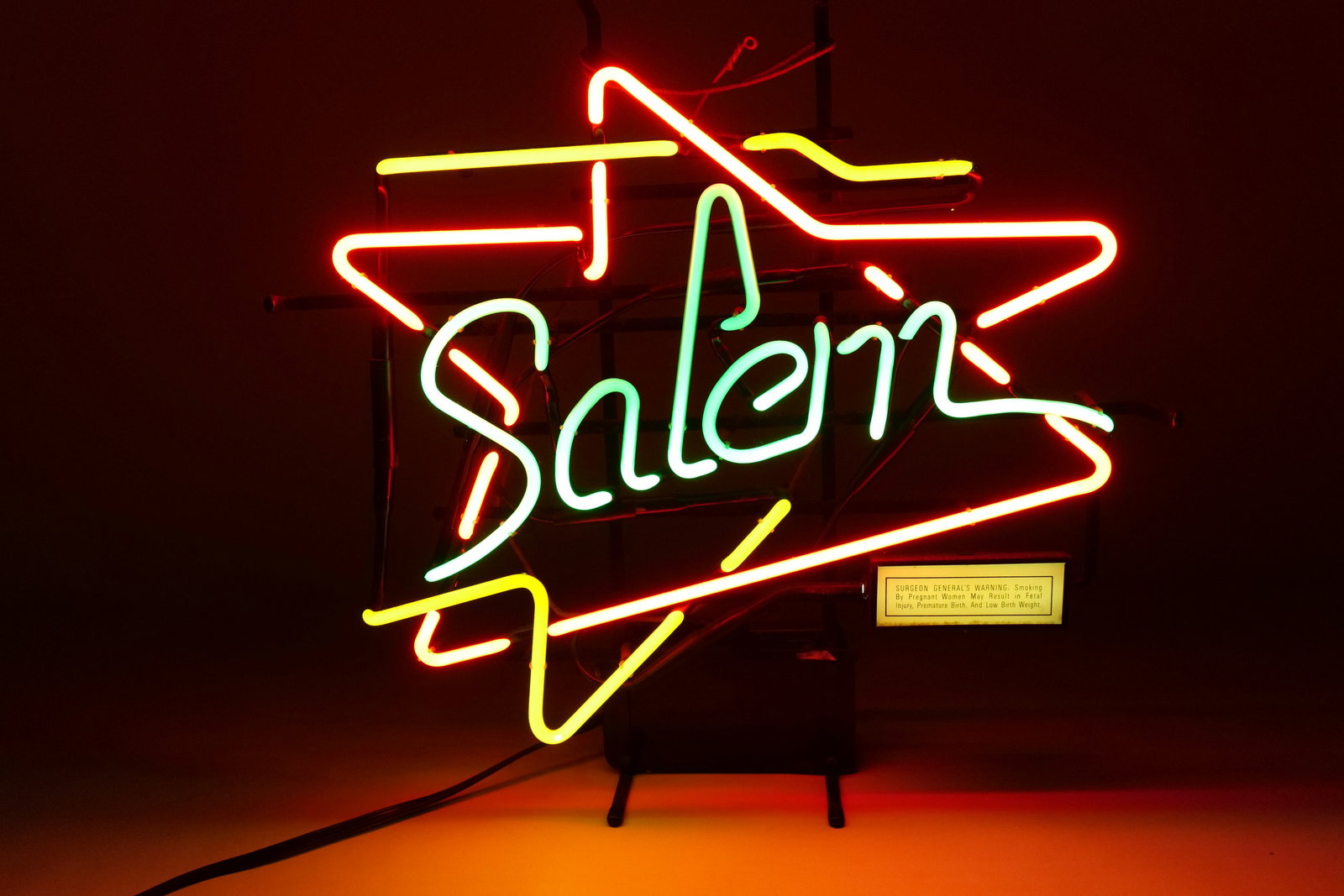 Vintage 1997 Salem Cigarette Neon Sign: Vintage 1997 Salem Cigarette Neon Sign. Made by Everbrite Inc. Date Coded Aug. 4, 1997. Includes original Surgeon General's Warning box attached to the frame. Tested and Working. Measures 21.75" tall