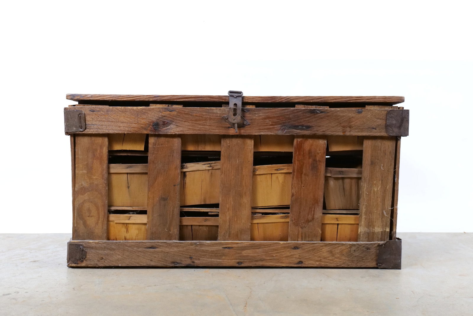 Antique Primitive Wooden Berry Transport Crate with Original Slat Baskets: Antique Wooden Shipping Crate is designed for transporting berries or small fruits. The exterior is constructed from weathered dark-stained wood slats with a rectangular profile and a hinged lid. The