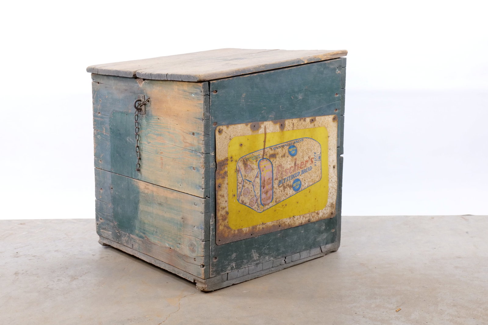 Vintage Fischer Baking Co. Wood Bread Delivery Chest: This is a commercial wooden delivery chest used by the Fischer Baking Co. for Fischer's Buttercup Bread. The chest is constructed of thick wooden planks featuring a heavily distressed dark green