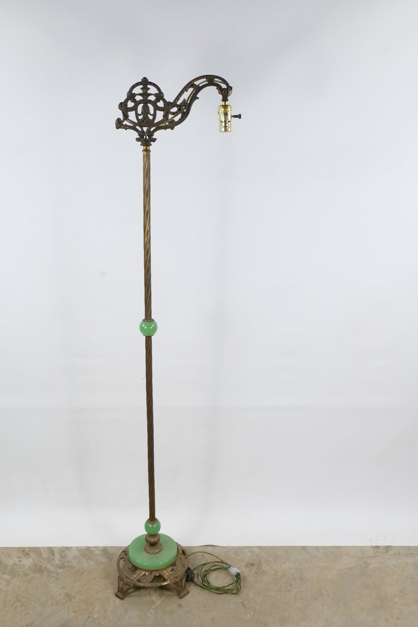 Antique Art Deco Bridge Floor Lamp: Antique Art Deco Bridge Floor Lamp - Cast Iron with Jadeite Green Glass Accents - Circa 1920's. Bridge has intricate scrollwork. The stand is uniquely accented with vibrant jadeite-green glass