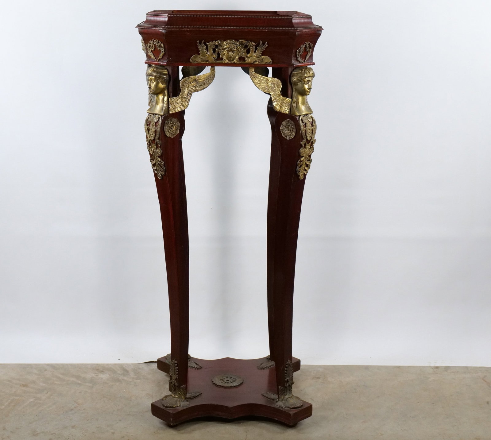 Ornate French Empire Style Pedestal Stand - Sphinx & Ormolu Mounts: Ornate French Empire Style Pedestal Stand - Sphinx & Ormolu Mounts. Has an octagonal galleried top. Has Medusa head medallions and intricate floral accents. Missing Marble Top. Measures 47.5" tall x