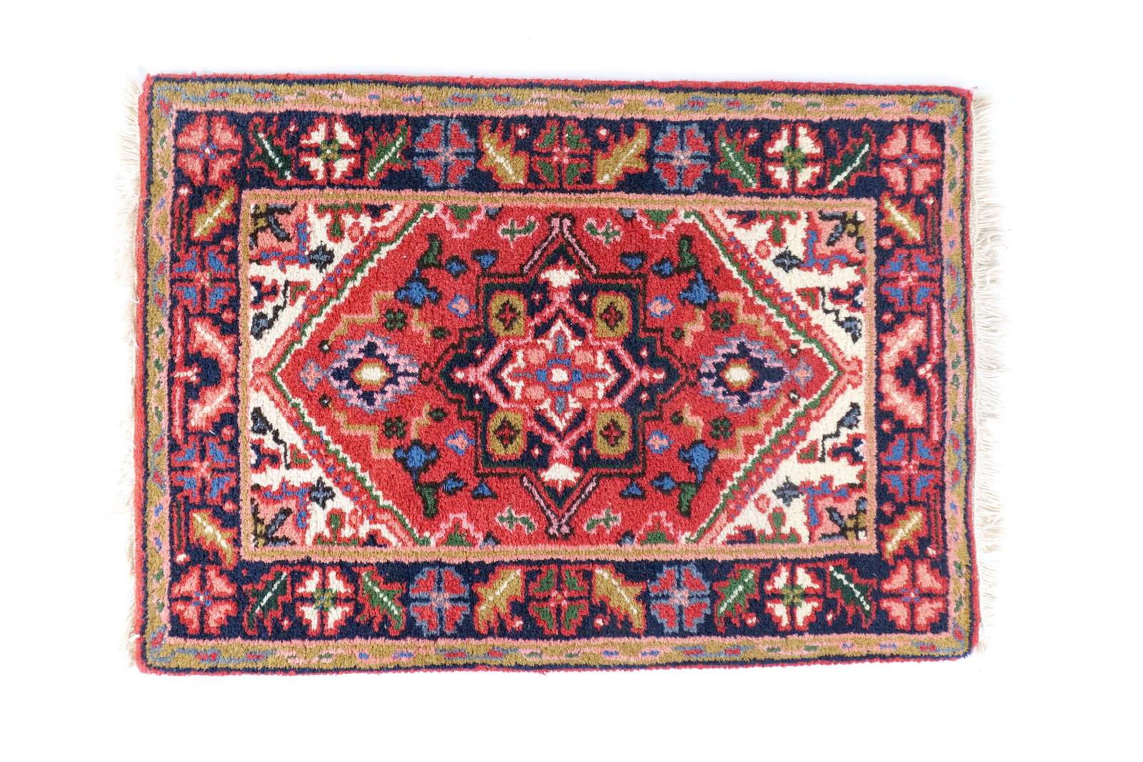Vintage Hand-Knotted Persian Medallion Rug: Vintage Hand-Knotted Persian Medallion Rug - Red and Navy Tribal Wool Accent. Authentic Hand Knotted Oriental Rug. Central Geometric Medallion with intricate floral borders and "herati" style motifs.