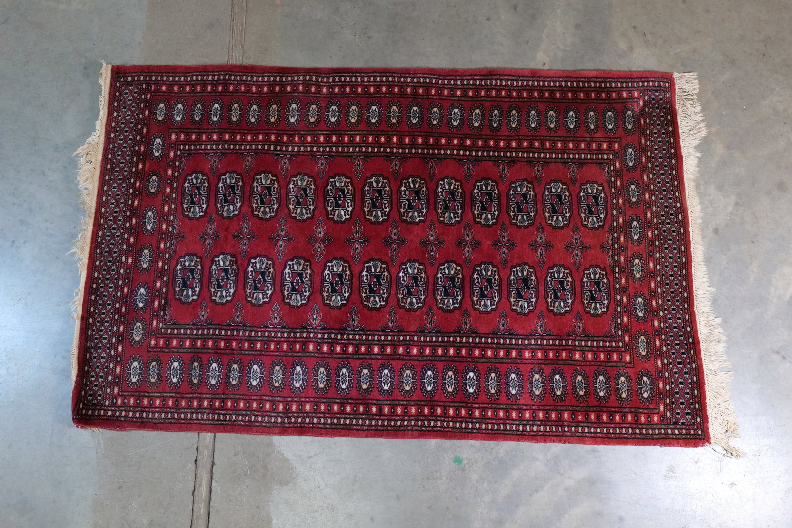 Vintage Hand-Knotted Bukhara Wool Runner: Vintage Hand-Knotted Bukhara Wool Runner - Classic Tekke Gul Design - Red & Navy. 100% Wool Pile on Cotton Foundation. Repeating Tekke Gul Medallion Pattern with a detailed geometric multi-border and
