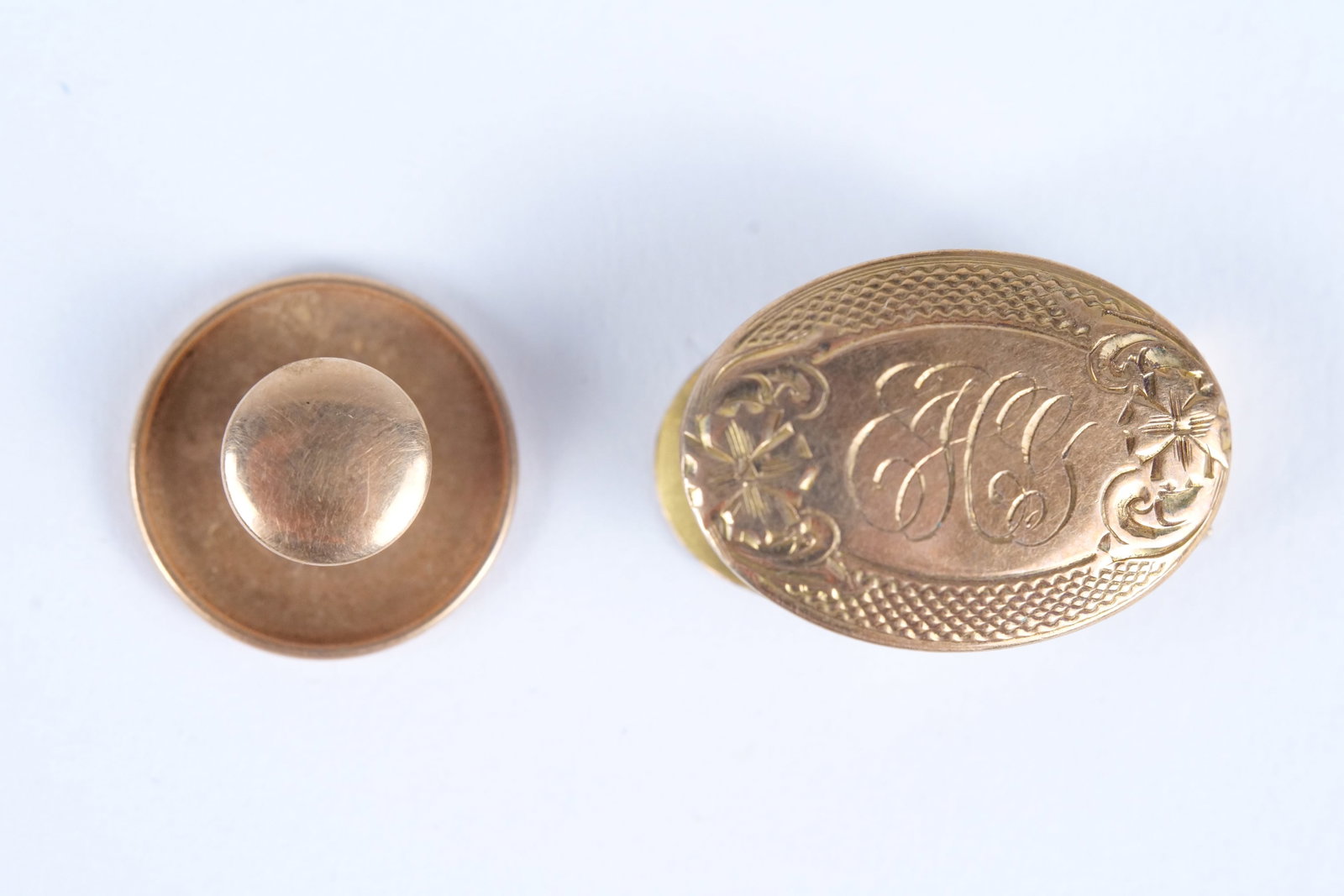 10K Yellow Gold Lot: A lot of 10 K yellow gold jewelry including a Krementz shirt stud and a 10 K yellow gold clip monogrammed on the front. The clip is marked but was also tested because the mark is illegible. They measu