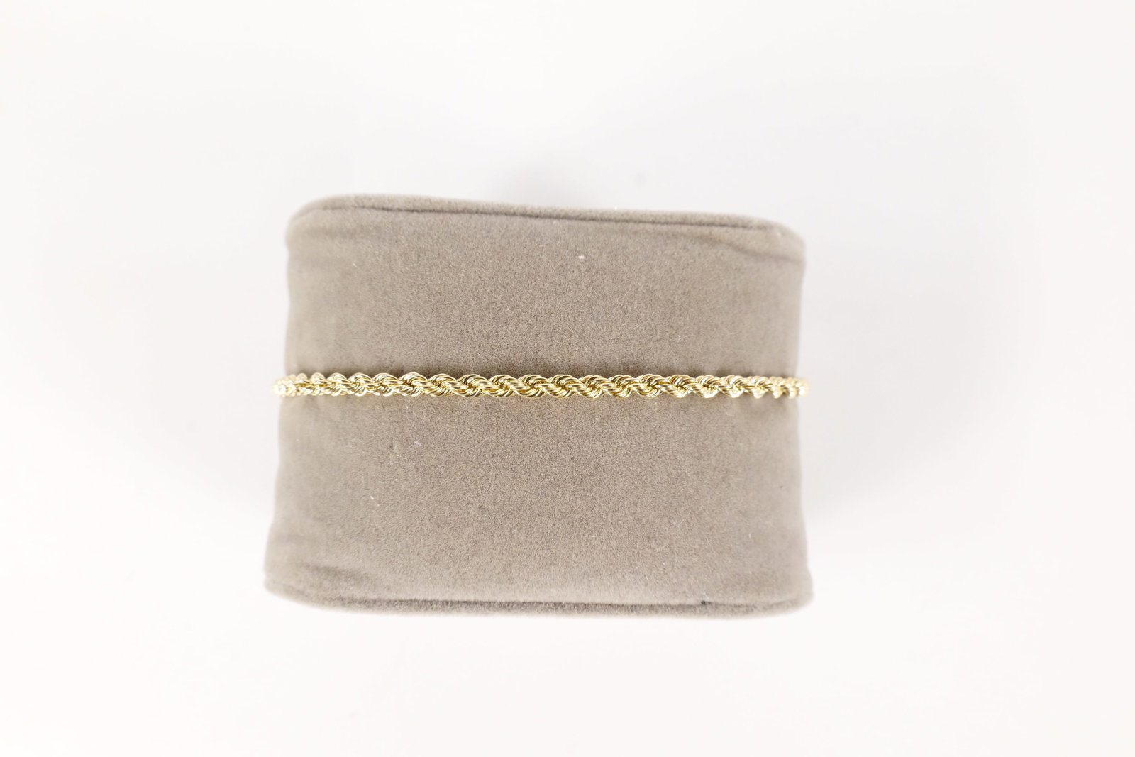 14K Rope Chain Bracelet: 14 K yellow gold rope chain bracelet. Is marked. Measures approximately 7 1/2". Weighs approx. 1.5g. All invoices must be paid within 24 hours of the sale. We offer multiple shipping options, please r