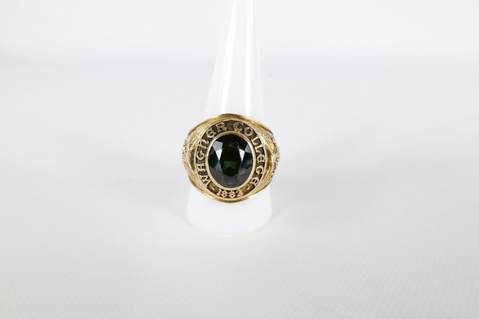 10K Men's School Ring: 10 K yellow gold Wagner College Men's school ring with green stone. 1961. Inscribed J. P. B. BA. Is marked but mark is slightly illegible was also tested. Size 11. Weighs approx. 21.9g with stone. All