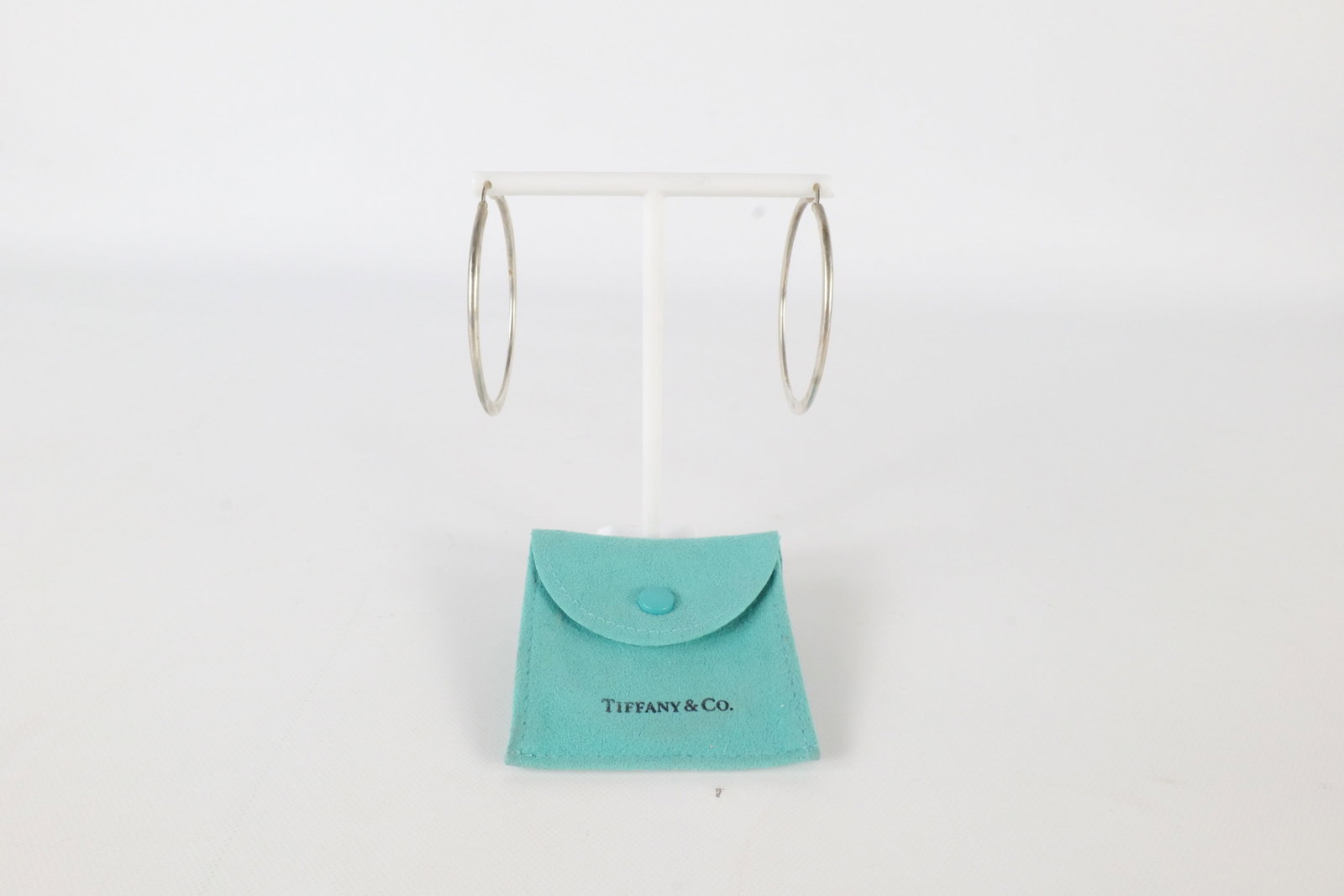 Vintage Tiffany & Co Earrings: A pair of vintage Tiffany & Company Elsa Peretti Hoop earrings. The earrings have Tiffany & Company, Elsa Peretti, 925 stamped at the base. They come in the original blue Tiffany bag. They measure app
