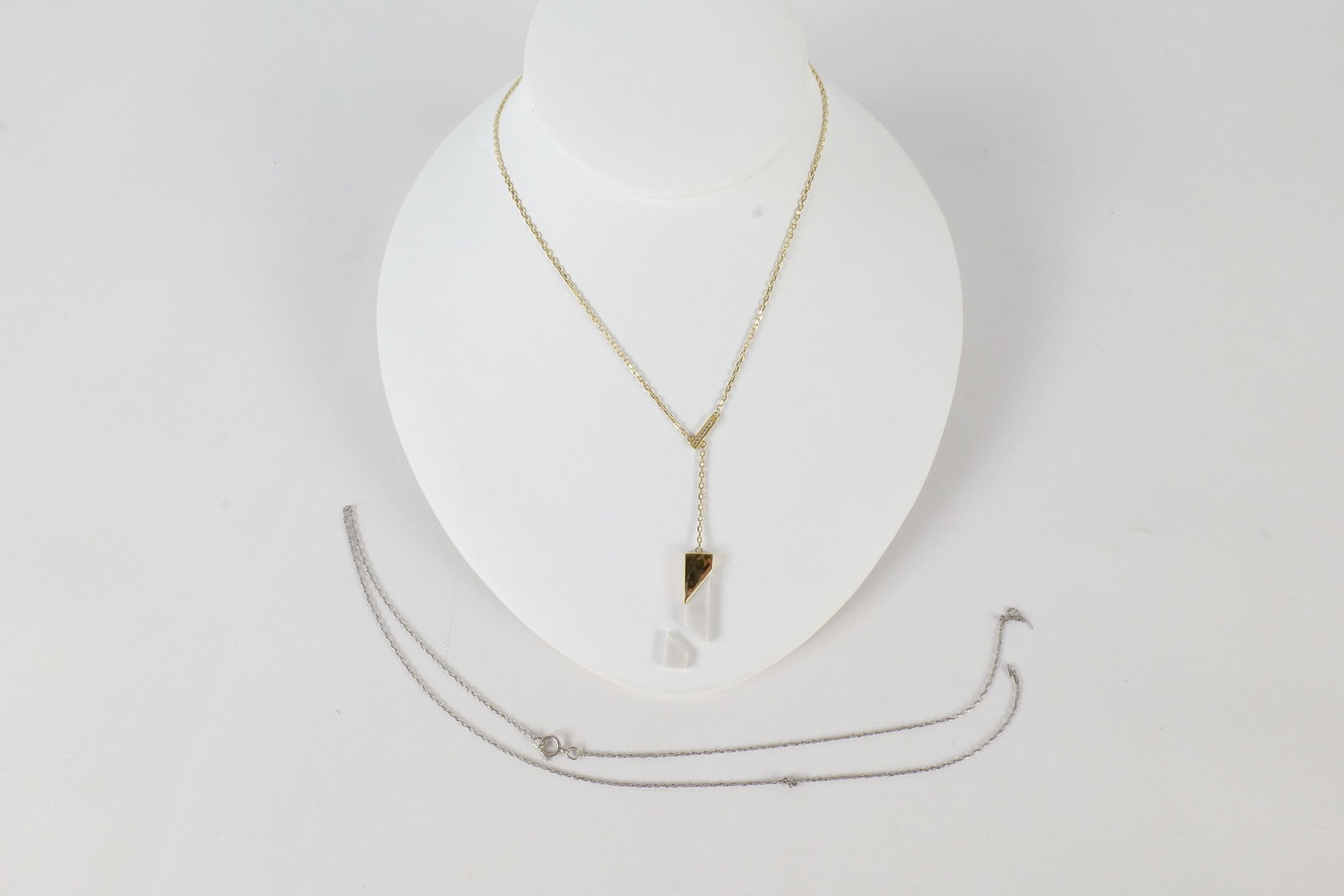 Lot of Scrap Investment Sterling: A lot of Scrap Investment sterling silver including a sterling chain that has broken in the center and a gold tone sterling chain with a drop pendant, the pendant has broken but can be repaired. All i