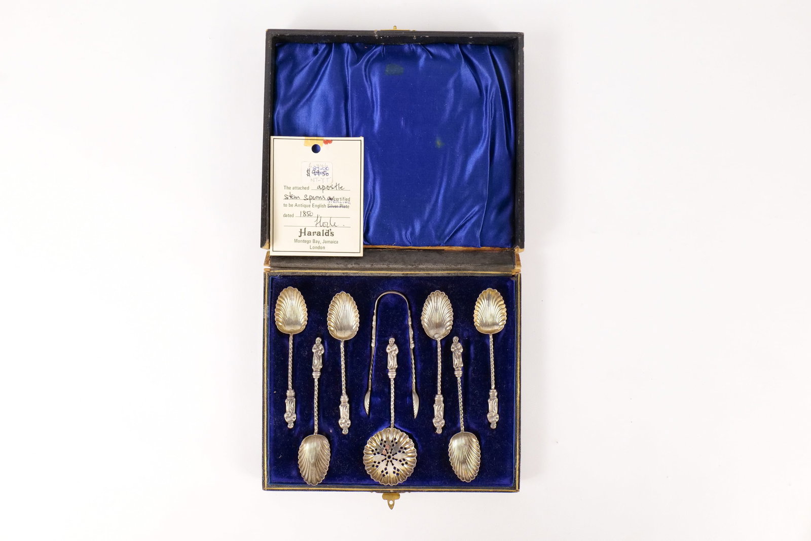 Antique Sterling Apostle Spoon Set: Antique Sterling Silver Apostle Demitasse stem spoon set with 6 Apostle spoons, sugar cube tongs and a sugar sifter. Comes in the original box and is dated 1850, HODE. Has the label from the antique s