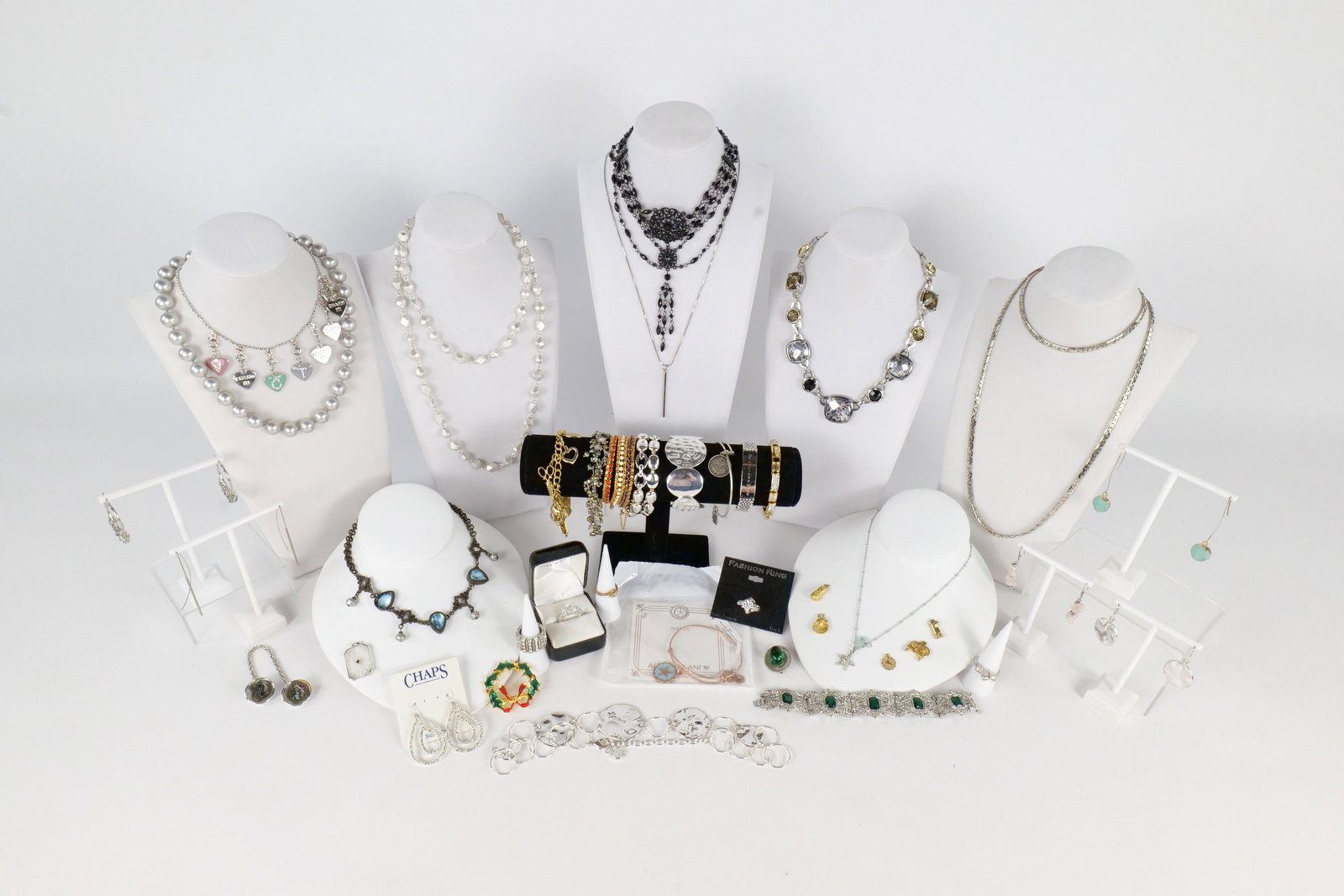 Lot of Costume Jewelry: Large lot of costume jewelery including Alex and Ani, Edwardian style jewelry, Victorian style jewelry, Asian style, natural stones, silver tone and more. All invoices must be paid within 24 hours of 