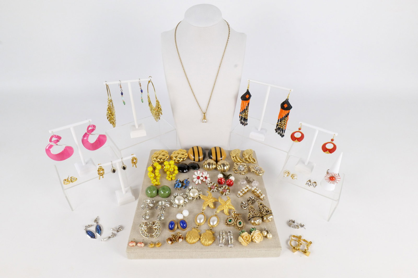 Lot of Assorted Costume Earrings - Clipped and Pierced: Lot of Assorted Costume Earrings - Clipped and Pierced. Some signed Amerique, Berebi, Richelieu, Napier, Gay Boyer, and Sandor. Various Styles including Gold Tone, Silver Tone, Wood, Gold Filled. A fe
