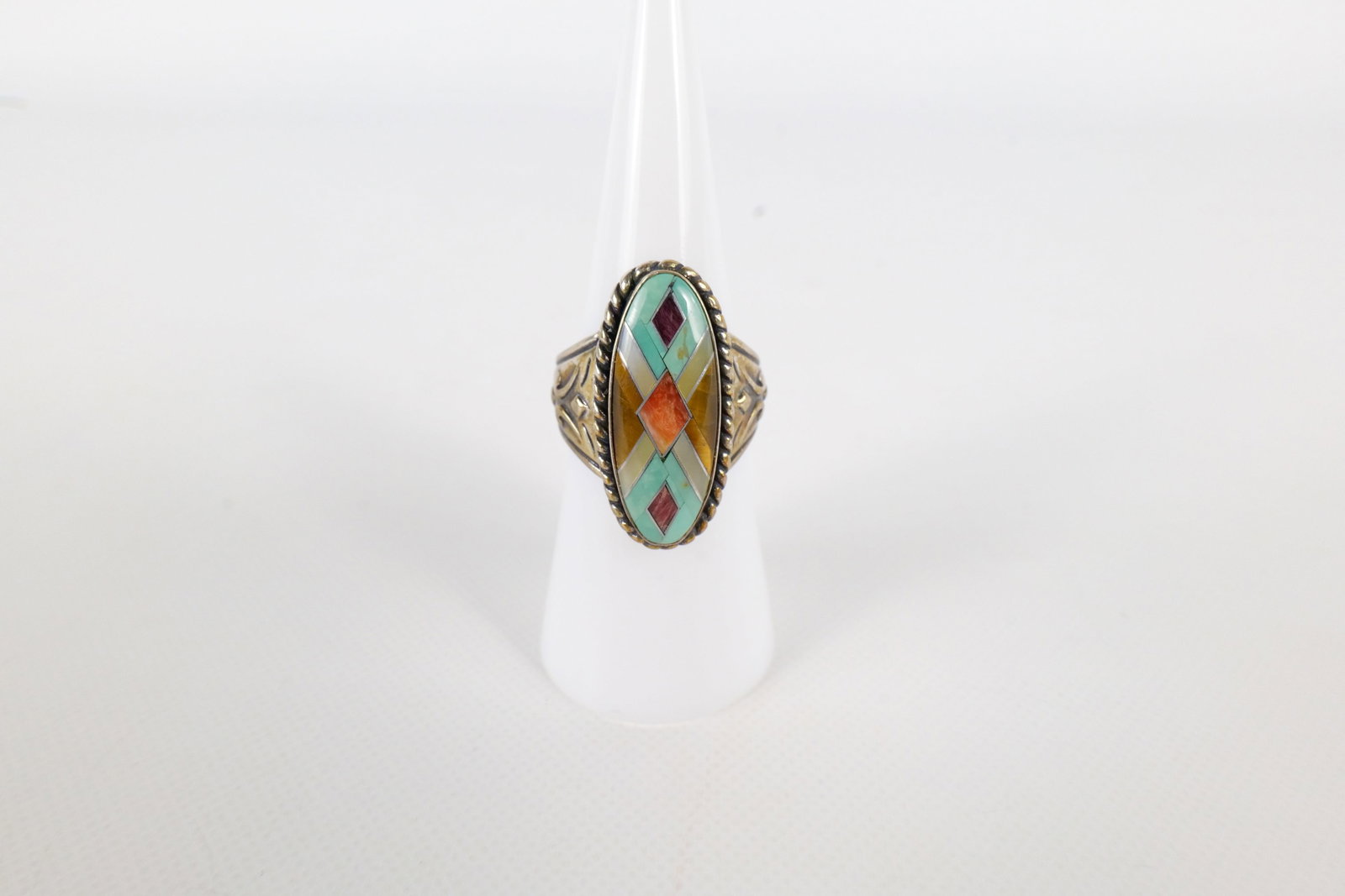 Carolyn Pollack Sterling Silver Oval Inlay Mosaic and Gemstone Ring: Relios Carolyn Pollack Sterling Silver Oval Inlay Mosaic and Gemstone Ring. Includes Turquoise, Tigers Eye, Mother of Pearl, and Spiny Oyster. Size 6. All invoices must be paid within 24 hours of the 
