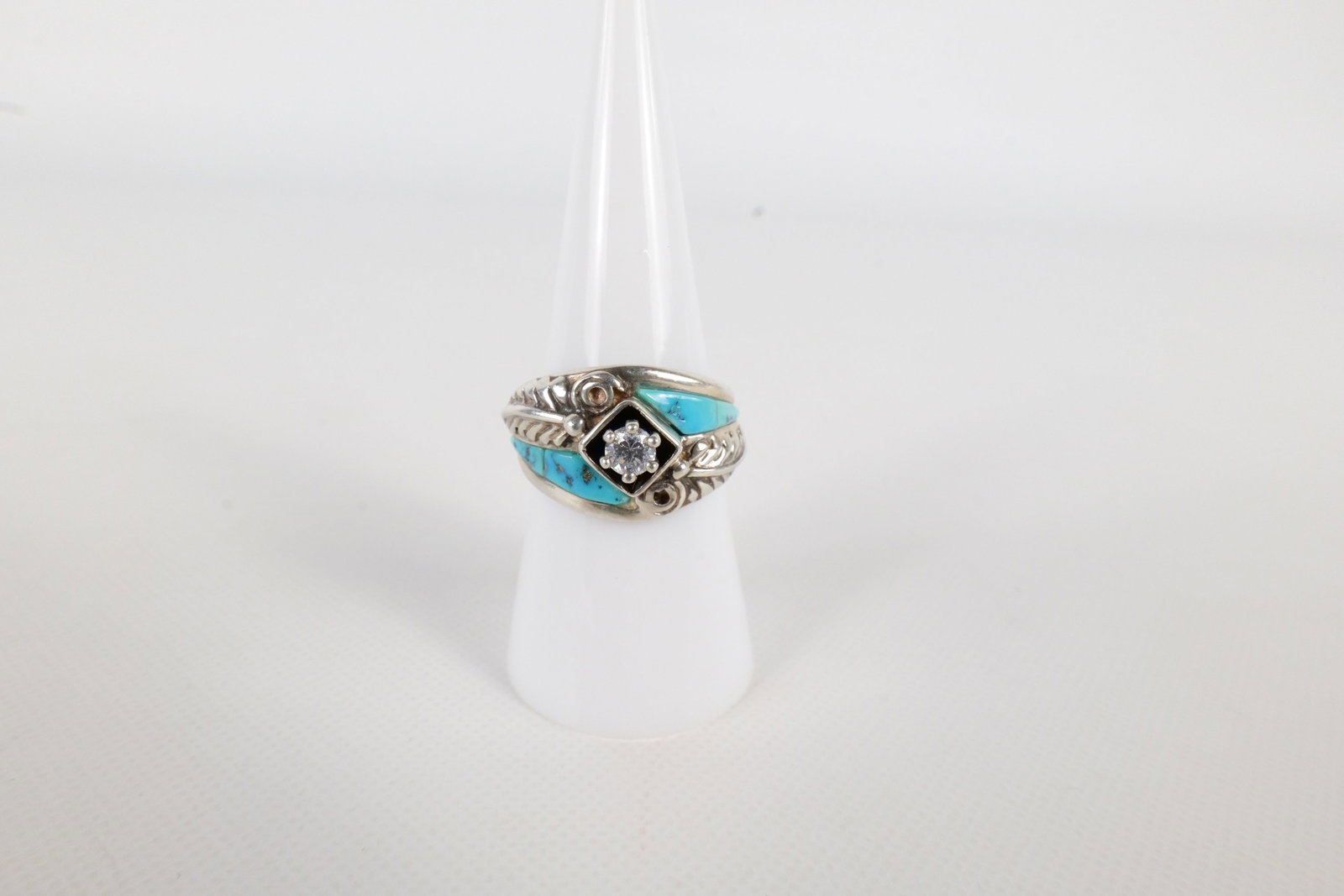 Carolyn Pollack Southwestern Turquoise & CZ Ring: Carlisle Jewelry Carolyn Pollack Southwestern Turquoise & CZ Ring. Size 7.5. All invoices must be paid within 24 hours of the sale. We offer multiple shipping options, please read the terms to
