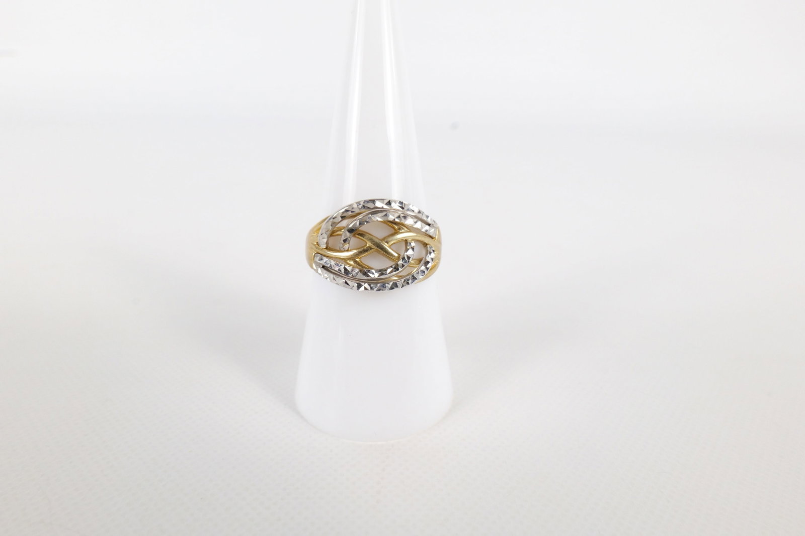 10k Marked White and Yellow Gold Diamond Cut Ring: 10k Marked White and Yellow Gold Diamond Cut Ring. Size 7 3/4. Weighs 3.4 grams. All invoices must be paid within 24 hours of the sale. We offer multiple shipping options, please read the terms to und