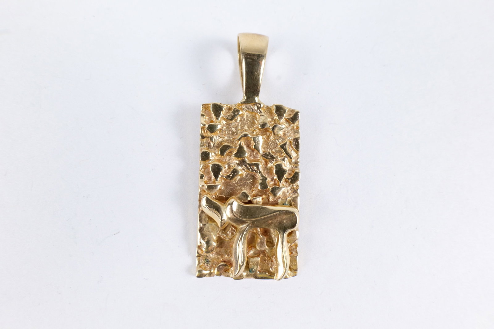 Vintage 14k Yellow Gold Chai Nugget Pendant - Judaica: Vintage 14k Yellow Gold Chai Nugget Pendant. Hebrew "Life" Symbol. Judaica. Measures 2" long with bail. Weighs 14.8 grams. All invoices must be paid within 24 hours of the sale. We offer multiple