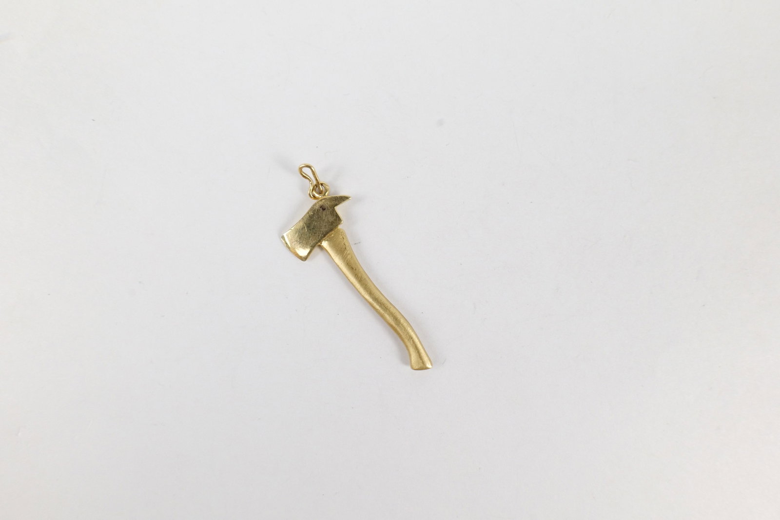 14k Fireman's Axe Charm: 14k Fireman's Axe Charm. Marked on Handle. Measures 1.5" long. Weighs 3 grams. All invoices must be paid within 24 hours of the sale. We offer multiple shipping options, please read the terms to
