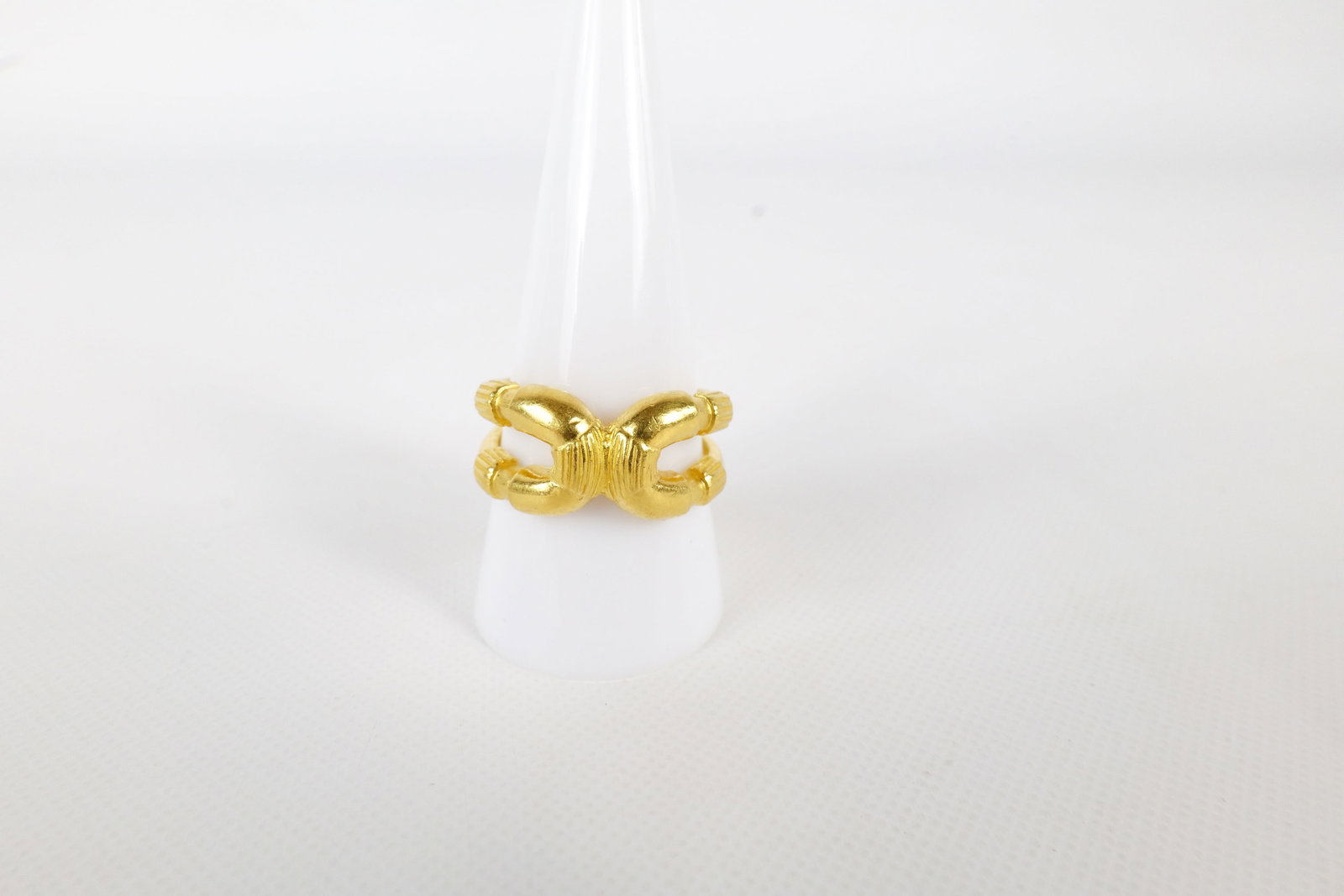 24k Yellow Gold Ring: 24k Yellow Gold Ring. Has 2 Horseshoe Links at front. Unmarked. Size 10.75. Weighs 11.7 grams. All invoices must be paid within 24 hours of the sale. We offer multiple shipping options, please read th