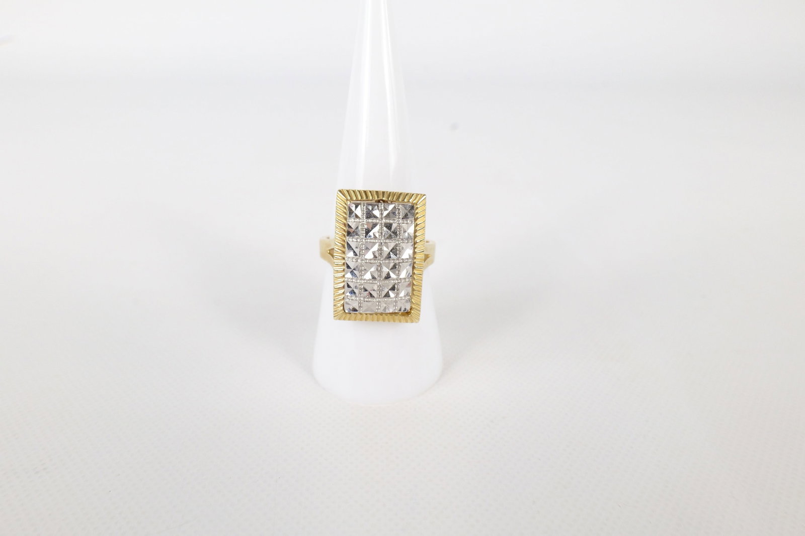 14k White and Yellow Gold Diamond Cut Ring: 14k White and Yellow Gold Diamond Cut Ring. Size 8. Weighs 5.4 grams. All invoices must be paid within 24 hours of the sale. We offer multiple shipping options, please read the terms to understand you