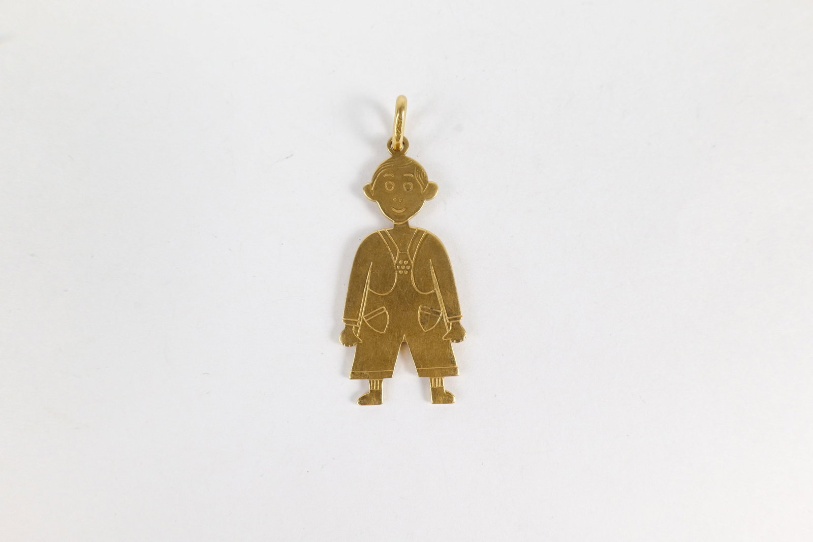 18k Little Boy Pendant/Charm: 18k Little Boy Pendant/Charm. Measures 1 5/8" long. Weighs 6.7 grams. All invoices must be paid within 24 hours of the sale. We offer multiple shipping options, please read the terms to understand you