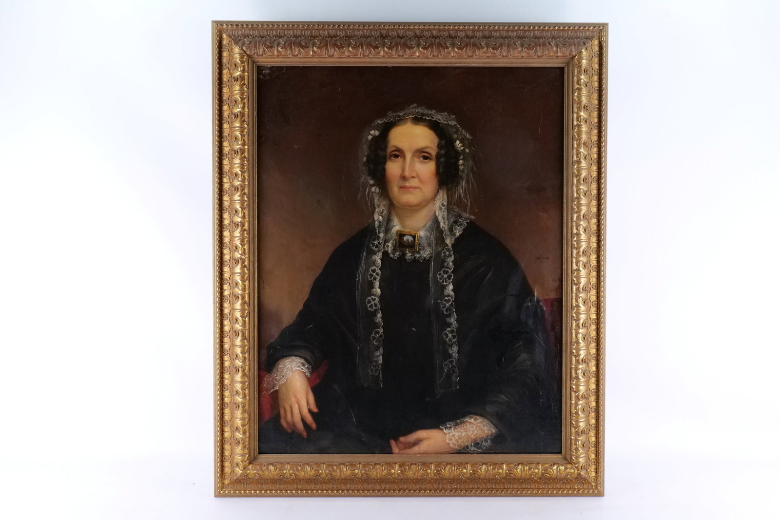 19th Century Oil on Canvas - Portrait: 19th Century Oil on Canvas. Depicting a Portrait of Woman in Mourning. Has be relined. Showing some repairs. Does have some surface scratching. Unsigned. Measures 41" tall x 34" wide. All invoices mus