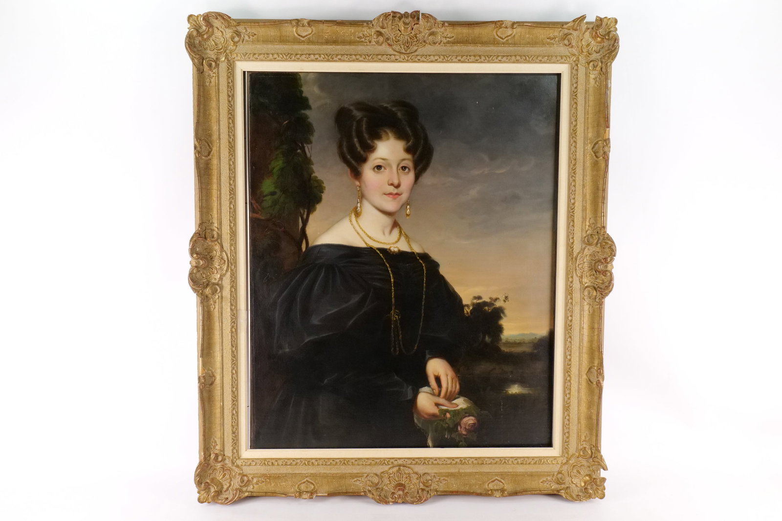 19th Century Oil on Canvas - Portrait: 19th Century Oil on Canvas - Portrait of a Woman holding a Rose. Appears to have been relined. Has a metal border behind frame. Frame AS-Found. Measures 45" tall x 39" wide. All invoices must be paid 