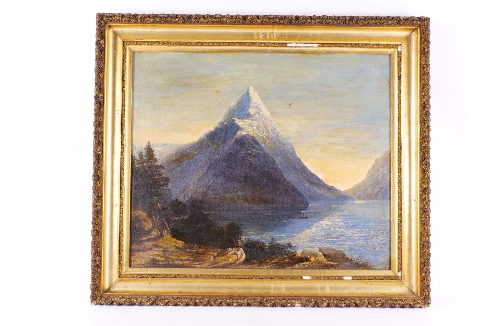 19th Century Oil on Canvas - Alpine Landscape: 19th Century Oil on Canvas of Alpine Landscape. Has a puncture to the right of the mountaintop. Frame is AS-Found. Measures 25.5" tall x 29.5" wide. All invoices must be paid within 24 hours of the sa