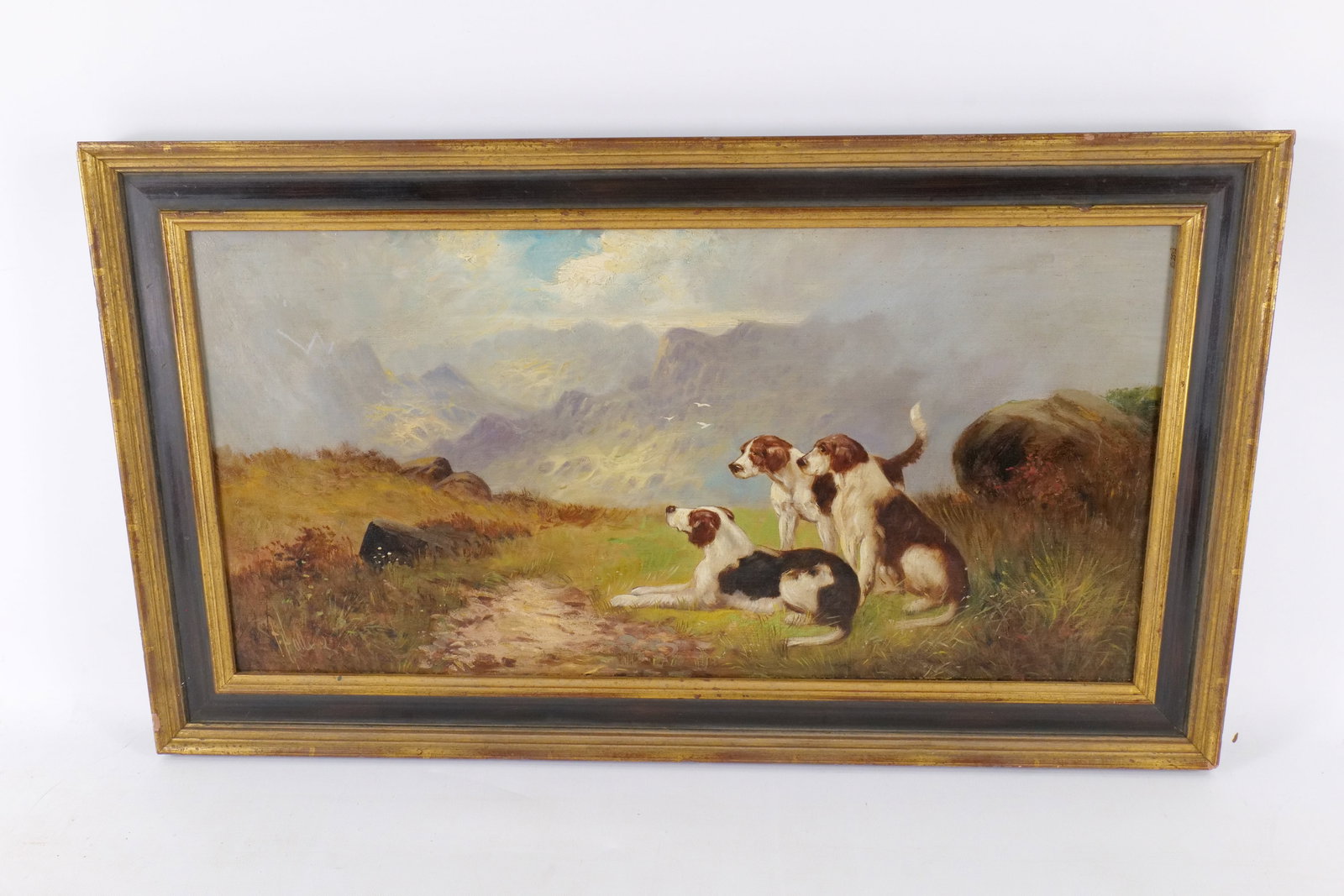 Oil on Canvas by Hans-Theodor Hallier - Hunting Dogs: Oil on Canvas by Hans-Theodor Hallier (1908-1982). Depicting Hunting Dogs in Highland Landscape. Signed lower left. Relined. Measures 15.5" tall x 27.5" wide. All invoices must be paid within 24 hours