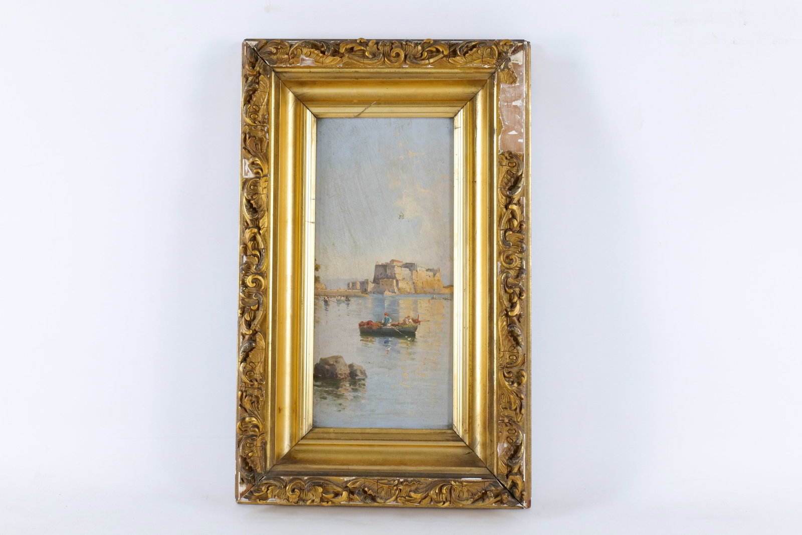 19th Century Oil on Wood Panel - Italian Seascape Scene: 19th Century Oil on Wood Panel - Depicting an Italian Seascape Scene. Likely The Bay of Naples. Features 2 Figures in Italian Fishing Boat with a Coastal Fortress in the background. Frame is AS-Found.