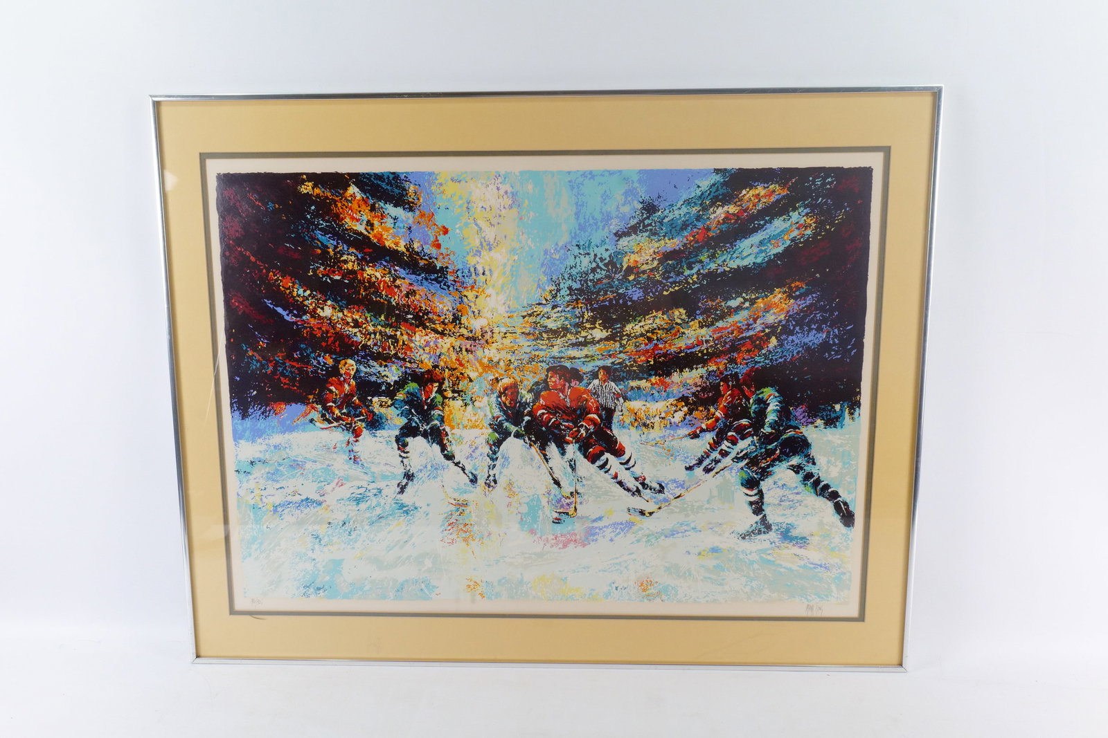 Limited Edition Signed Serigraph by Mark King - Hockey: Limited Edition Signed Serigraph by Mark King (1931-2014) - Hockey. Depicts a hockey team in action. Signed and Numbered #194/325. Framed and Matted. Frame has some scratching to the plexiglass. Measu