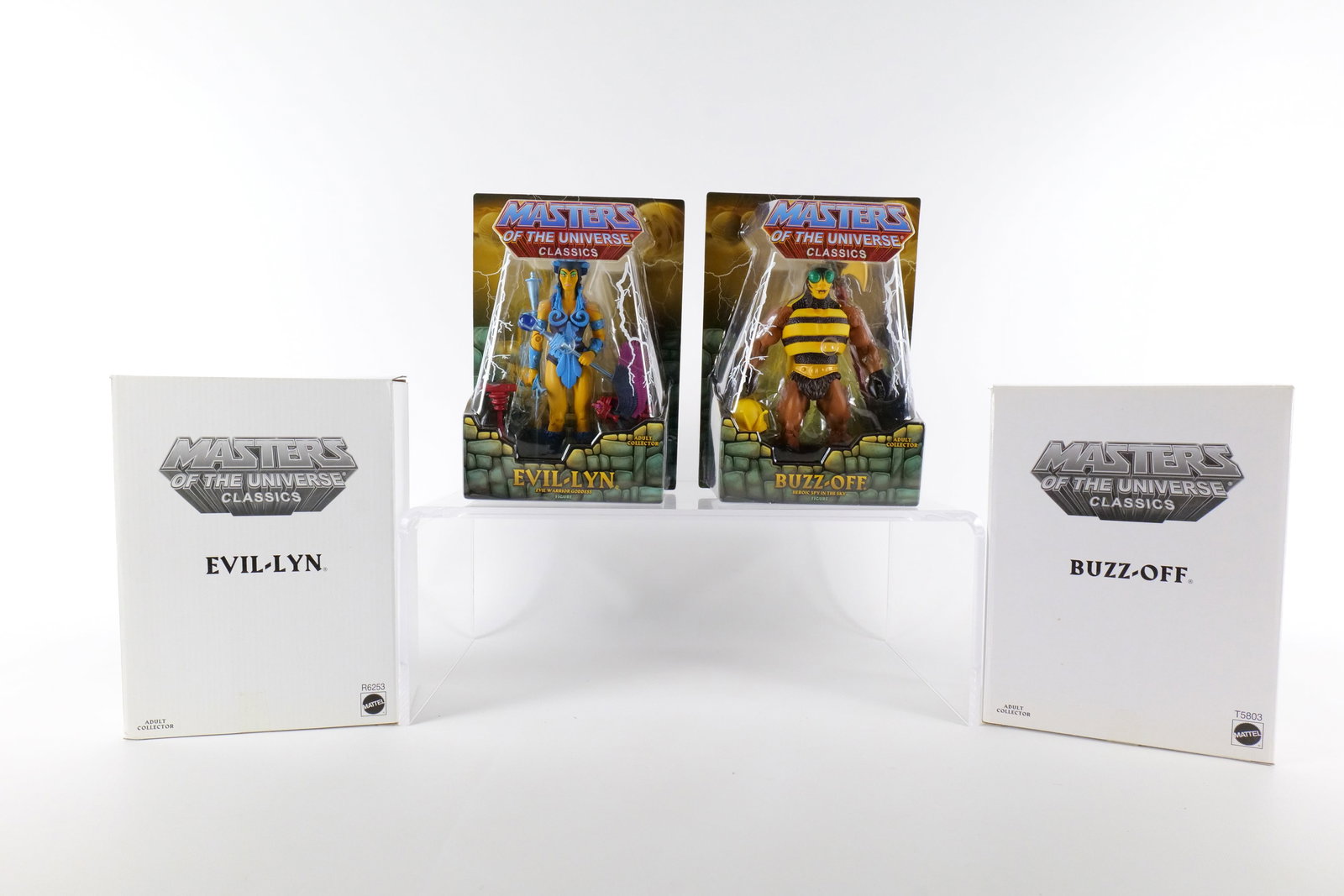 Lot of 2 Masters of the Universe Classics Action Figures: Lot of 2 Masters of the Universe Classics Action Figures. MOTU. Including Buzz-Off and Evil-Lyn. Both New in Package - Both come with the white outer boxes. Made by Mattel - 2009/2010. All invoices mu