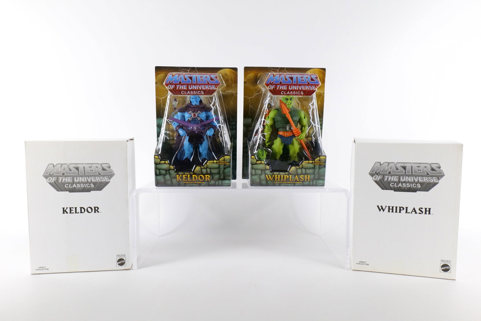 Lot of 2 Masters of the Universe Classics Action Figures: Lot of 2 Masters of the Universe Classics Action Figures. MOTU. Including Keldor and Whiplash. Both New in Package - Both come with the white outer boxes. Made by Mattel - 2009/2010. All invoices must