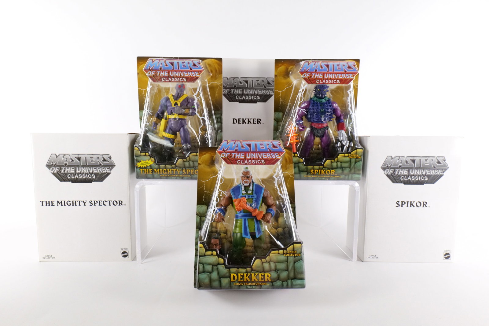 Lot of 3 Masters of the Universe Classics Action Figures: Lot of 3 Masters of the Universe Classics Action Figures. MOTU. Including Spikor, The Mighty Spector, and Dekker. All New in Package - All come with the white outer boxes. Made by Mattel - 2012. All i