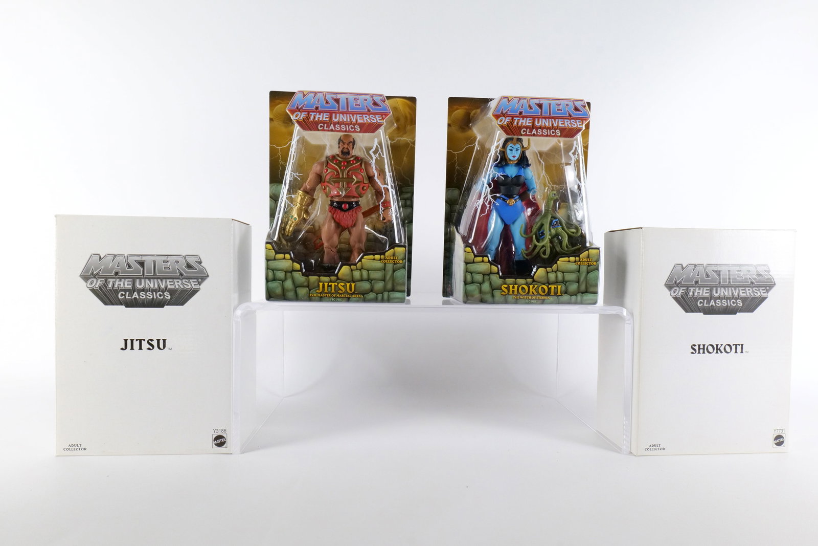 Lot of 2 Masters of the Universe Classics Action Figures: Lot of 2 Masters of the Universe Classics Action Figures. MOTU. Including Jitsu and Shokoti. Both New in Package - Both come with the white outer boxes. Made by Mattel - 2012. All invoices must be pai