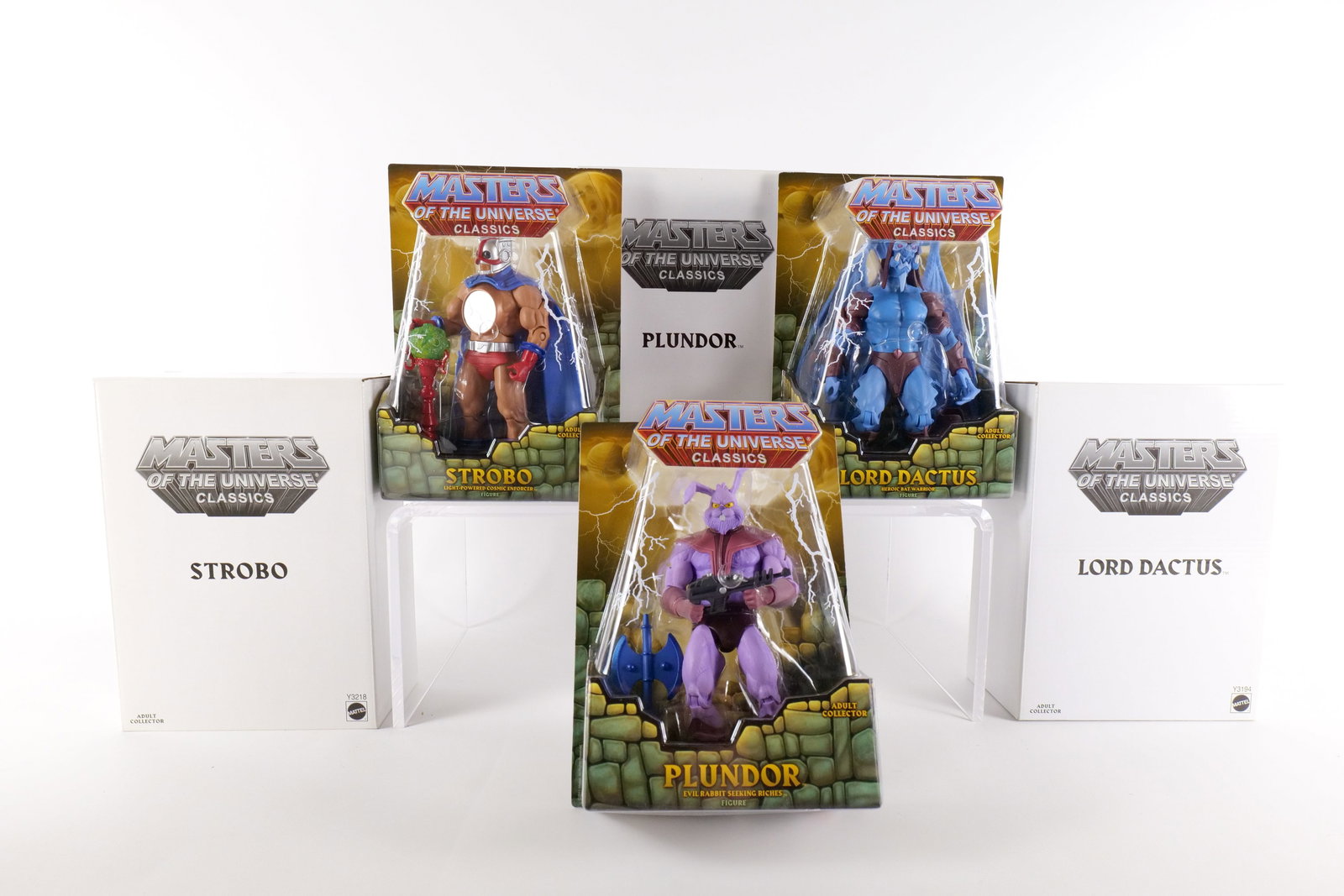 Lot of 3 Masters of the Universe Classics Action Figures: Lot of 3 Masters of the Universe Classics Action Figures. MOTU. Including Plundor, Lord Dactus, and Strobo. All New in Package - All come with the white outer boxes. Made by Mattel - 2013. All invoice