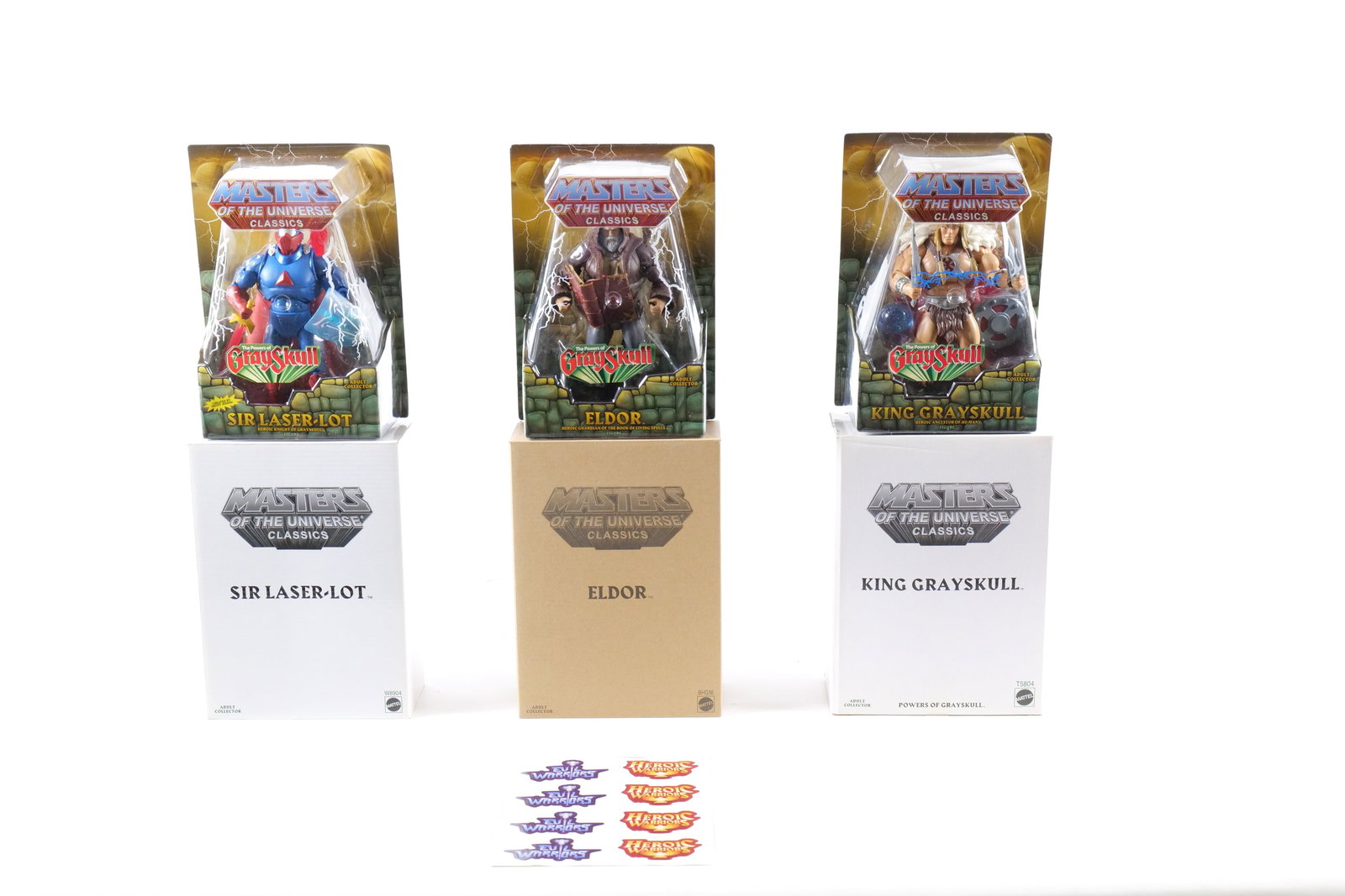 Lot of 3 Masters of the Universe Classics Figures: Lot of 3 Masters of the Universe Classics Figures - The Powers of Gray Skull - Motu. Including King Grayskull, Eldor, and Sir Laser-Lot. All are Sealed in Package with white and brown outer boxes. Mat