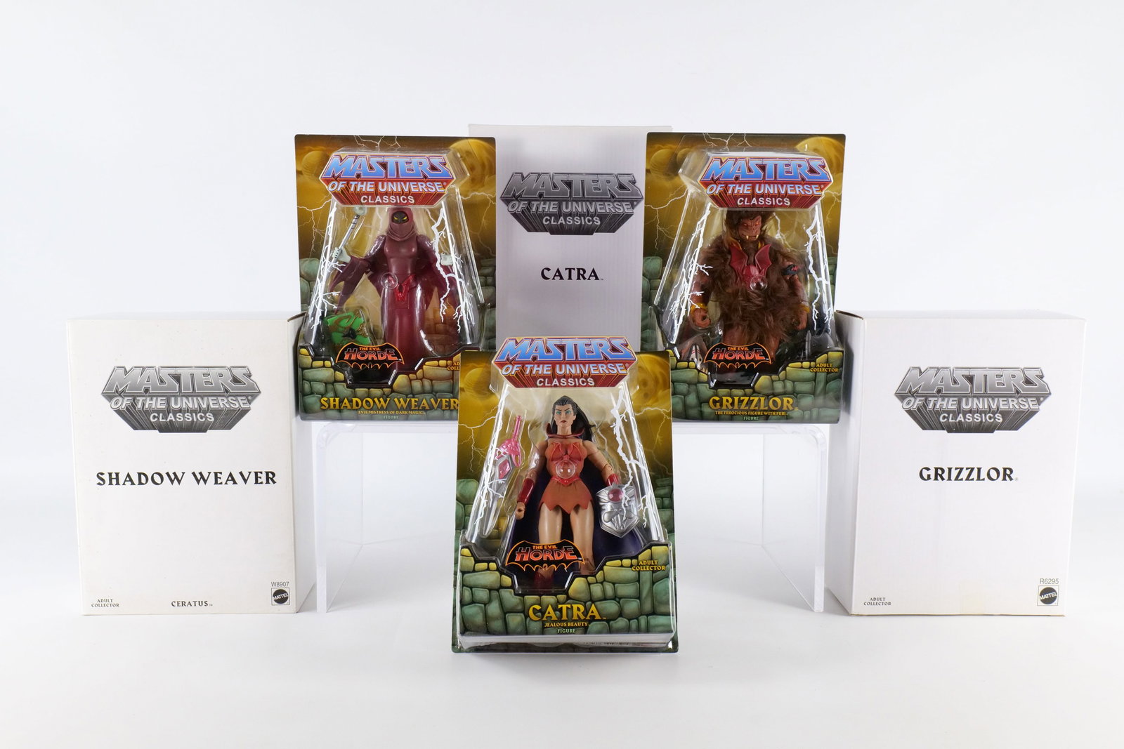 Lot of 3 Masters of the Universe The Evil Horde Action Figures: Lot of 3 Masters of the Universe The Evil Horde Action Figures - MOTU. Including Shadow Weaver, Catra, and Grizzlor. Mattel - Matty Collector 2010/2011. All sealed in package and comes with the white 