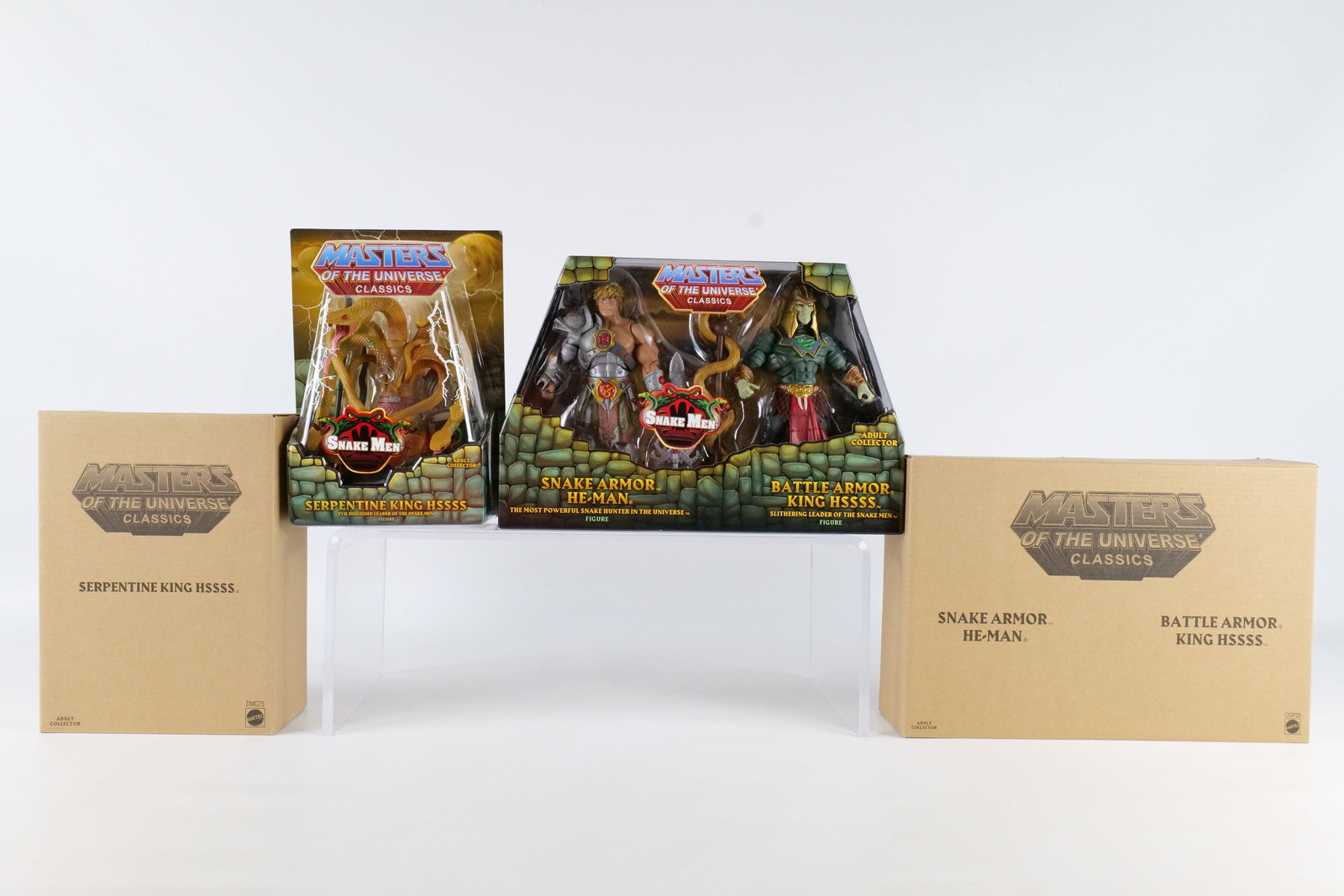 Lot of 2 Masters of the Universe Snake Men Action Figures: Lot of 2 Masters of the Universe Snake Men Action Figures - MOTU. Including Serpentine King Hssss and 2 Pack - Snake Armor He-Man & Battle Armor King Hssss. Mattel - Matty Collector 2014/2015. Both se