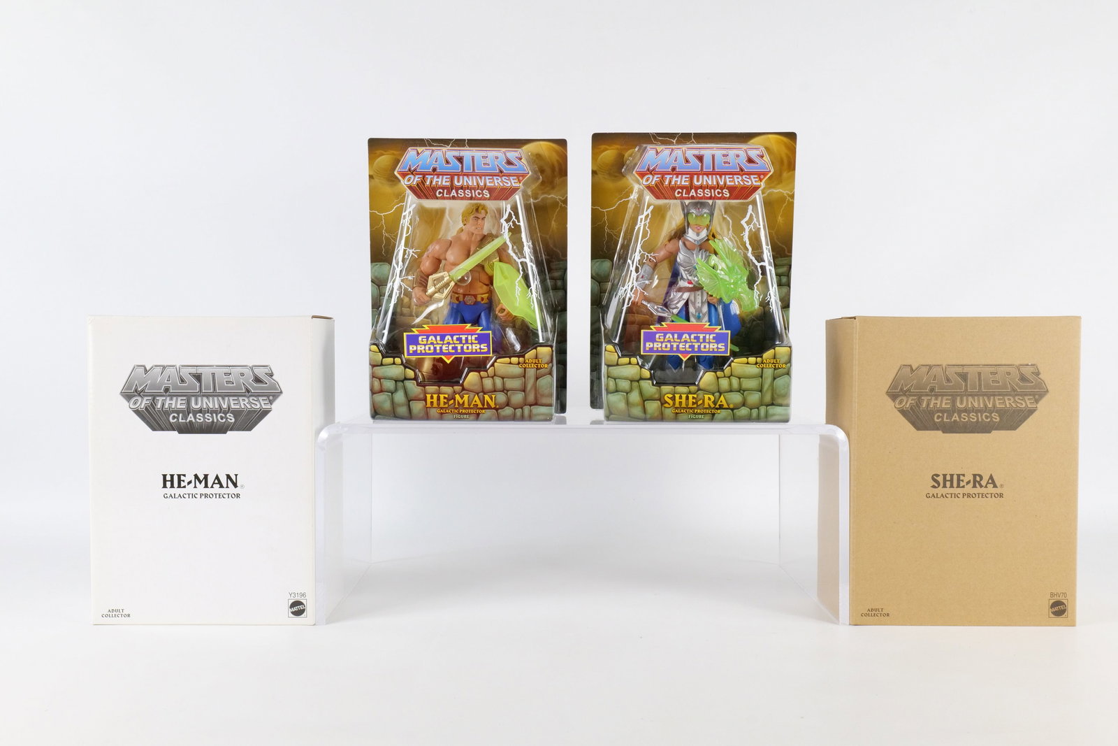 Lot of 2 Masters of the Universe Galactic Protectors Action Figures: Lot of 2 Masters of the Universe Galactic Protectors Action Figures - MOTU. Including He-Man and She-Ra. Mattel - Matty Collector 2013/2014. Both sealed in package and comes with the white and brown o