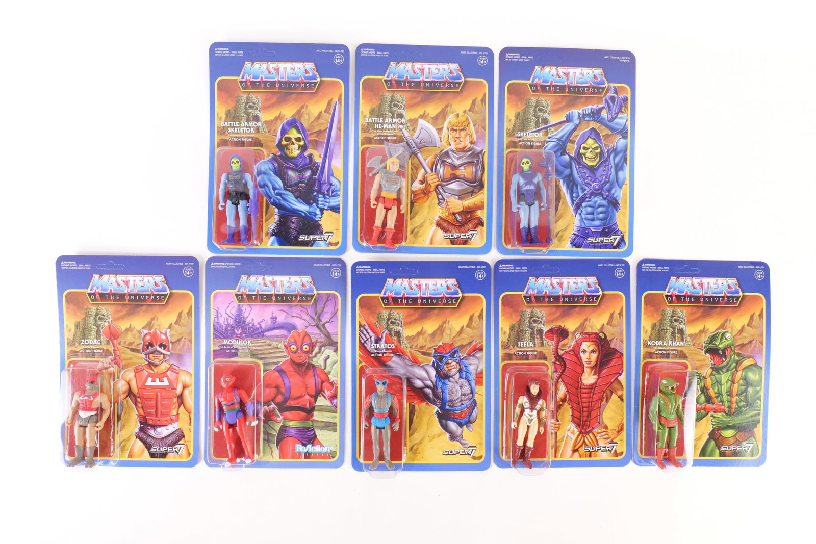 Lot of 8 Super7 ReAction Masters of the Universe Figures: Lot of 8 Super7 ReAction Masters of the Universe Figures. Including Kobra Khan, Zodac, Modulok, Skeletor, Stratos, Teela, Battle Armor He-Man, and Battle Armor Skeletor. All sealed on package. All inv