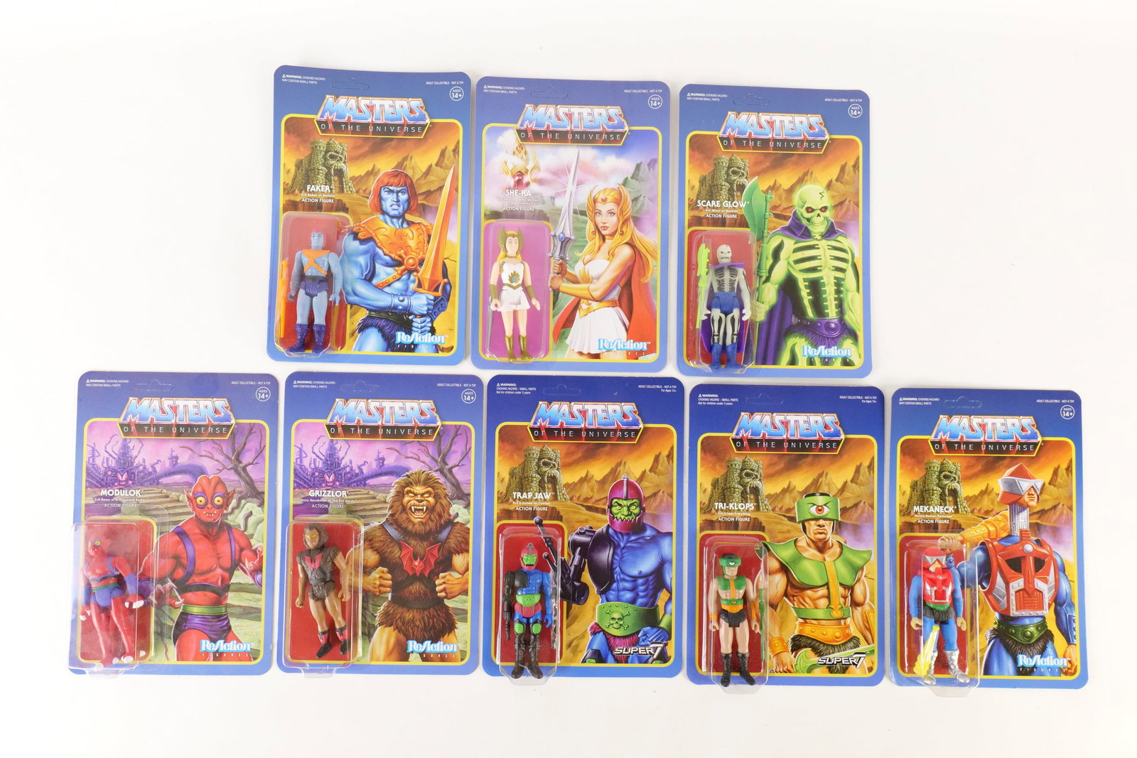 Lot of 8 Super7 ReAction Masters of the Universe Figures: Lot of 8 Super7 ReAction Masters of the Universe Figures. Including Faker, Trap Jaw, Tri-Klops, Scare Glow, Modulok, She-Ra, Grizzlor, and Mekaneck. All sealed on card. All invoices must be paid withi