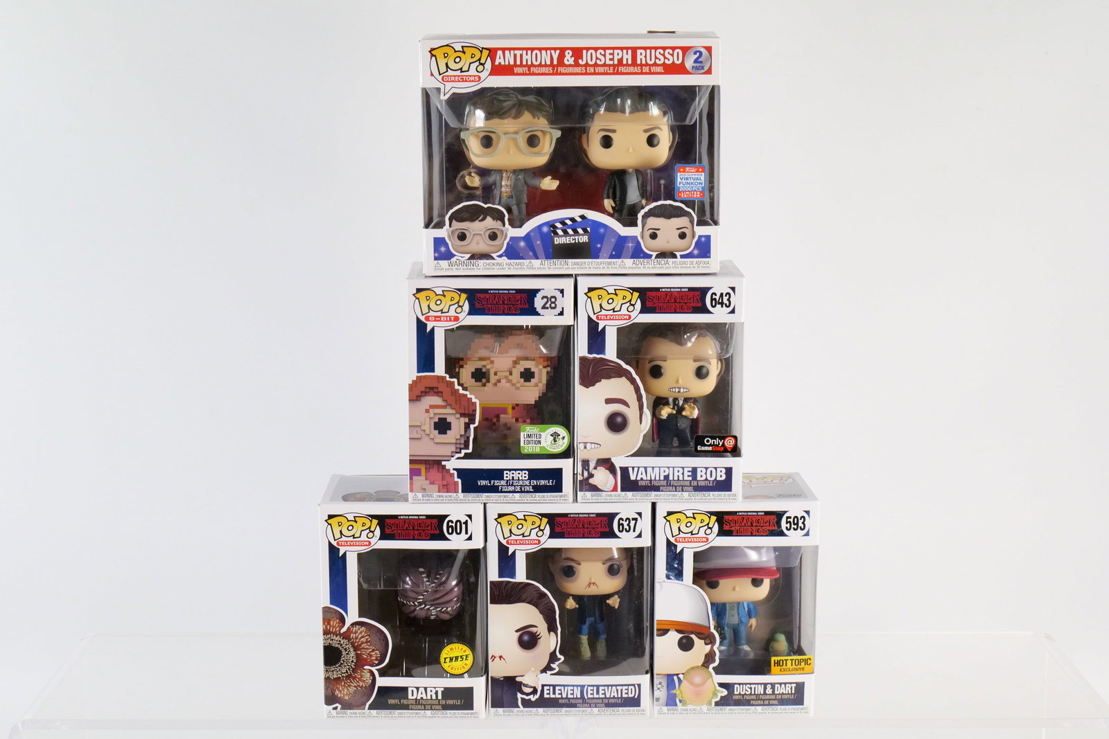 Lot of Funko Stranger Things Pops: Lot of Funko Stranger Things Pops. Including Barb 8-Bit #28 Emerald City, Dustin & Dart #593 Hot Topic, Dart #601 Chase, Eleven (Elevated) #637, Vampire Bob #643 Gamestop, and Anthony & Joseph Russo 2