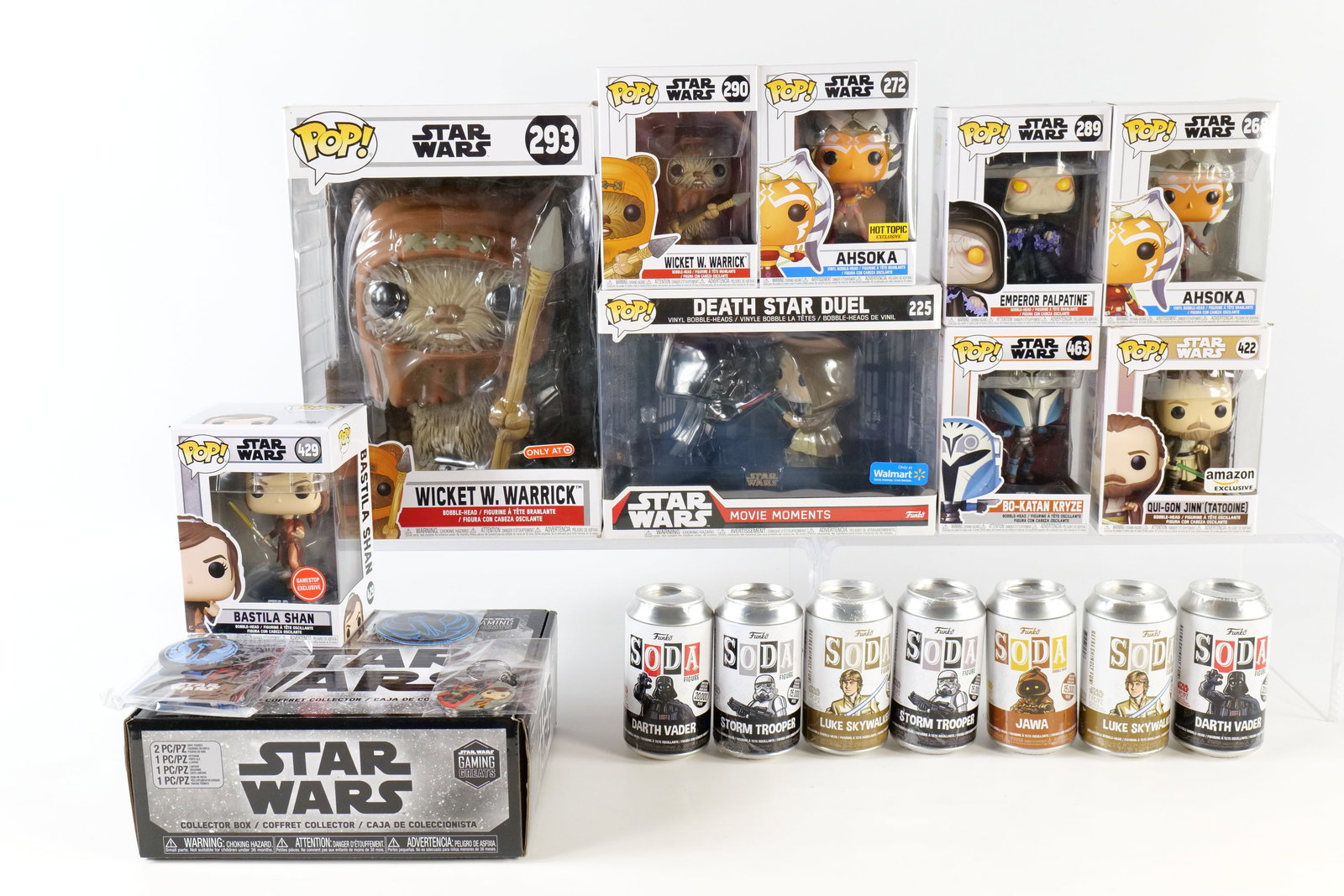 Group Lot of Funko Star Wars Items: Group Lot of Funko Star Wars Items. Including Figures: Ahsoka #268, Ahsoka #272 Hot Topic, Emperor Palpatine #289, Wicket W. Warrick #290, Qui-Gon Jinn (Tatooine) #422 Amazon - Rip on box, and Collect