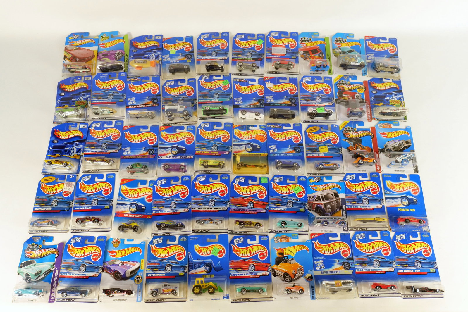 Lot of 50 Carded Hot Wheels: Lot of 50 Carded Hot Wheels. Including Blimp, Dirty Outlaw, Volkswagen Kool Kombi, and More. Includes some duplicates. Some of the cards have wear. All invoices must be paid within 24 hours of the sal