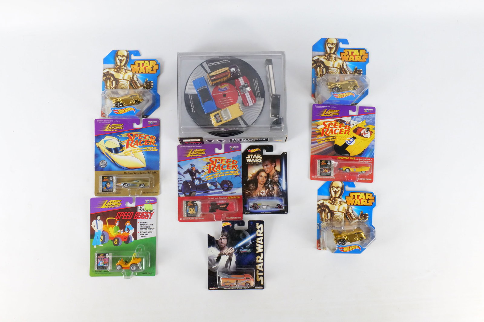 Lot of 10 Hot Wheels and Johnny Lightning Cars: Lot of 10 Hot Wheels and Johnny Lightning Cars. Including Speed Racer, Star Wars and Motorin' Music. All sealed in package. Package has some wear. All invoices must be paid within 24 hours of the sale