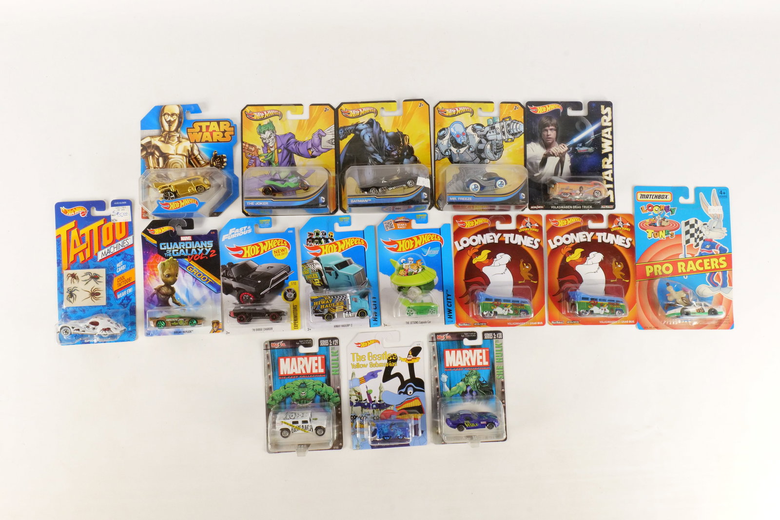 Lot of 16 Hot Wheels Cars: Lot of 16 Hot Wheels Cars. Including The Jetsons, Star Wars, Tattoo Machines, The Hulk, Looney Tunes and More. All invoices must be paid within 24 hours of the sale. We offer multiple shipping options